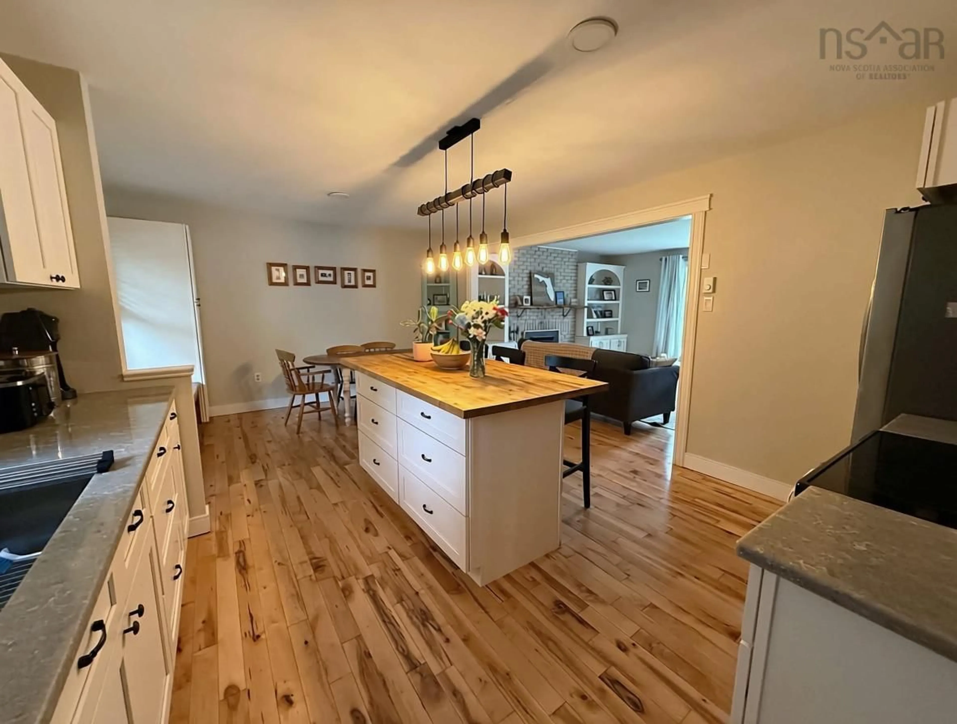 Open concept kitchen, wood/laminate floor for 4 Maple Cres, Lantz Nova Scotia B2S 1W8