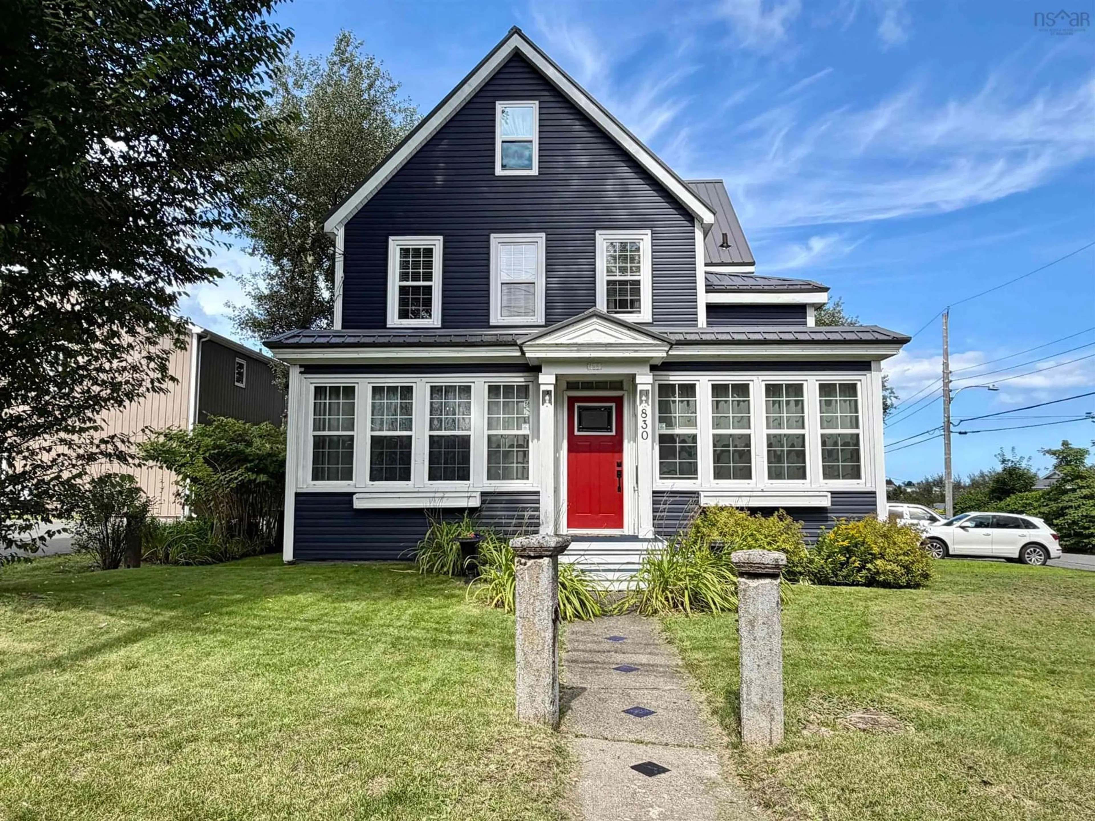 Home with vinyl exterior material, street for 830 Main St, Glace Bay Nova Scotia B1A 4Z4