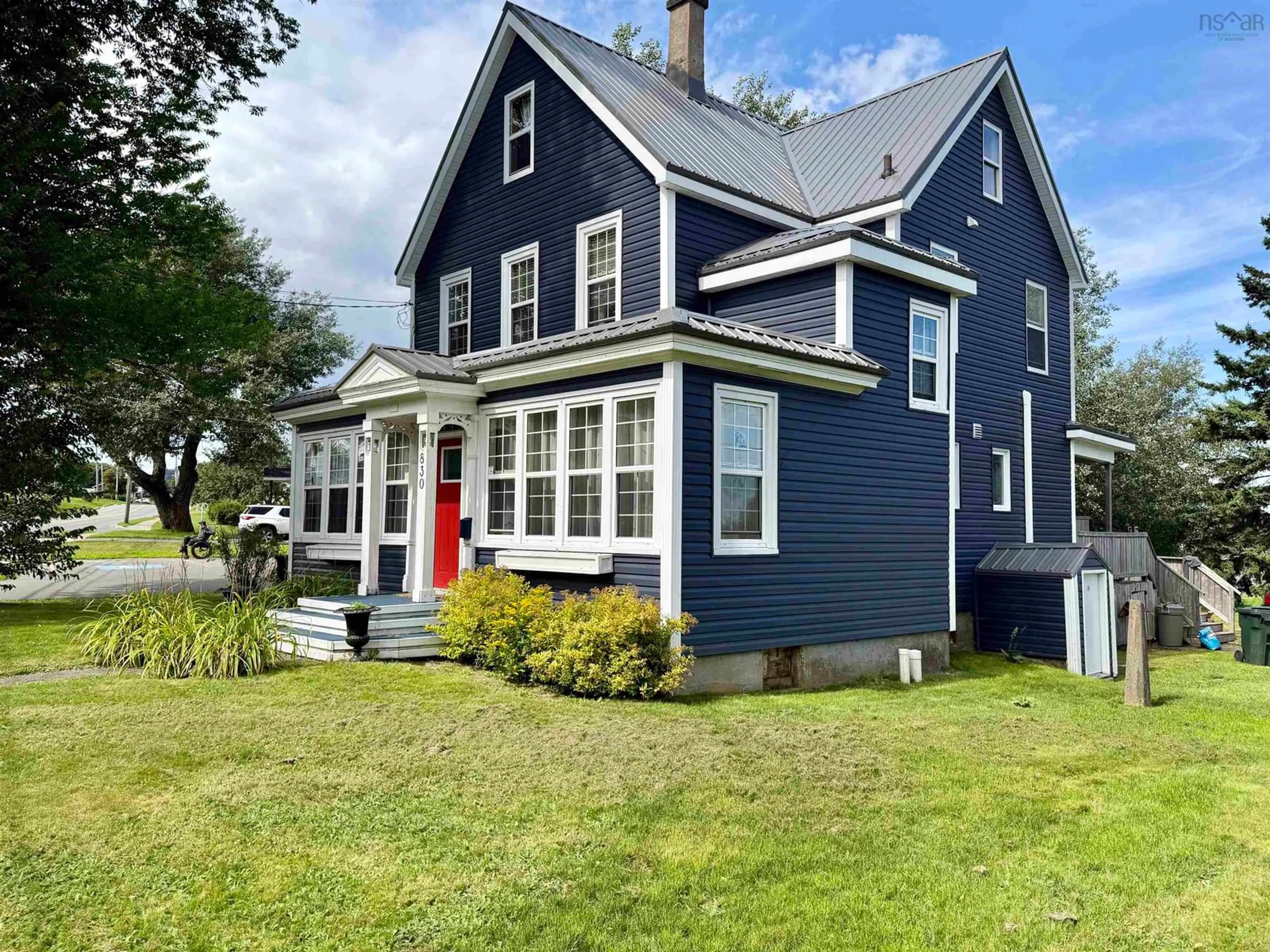 Home with vinyl exterior material, street for 830 Main St, Glace Bay Nova Scotia B1A 4Z4