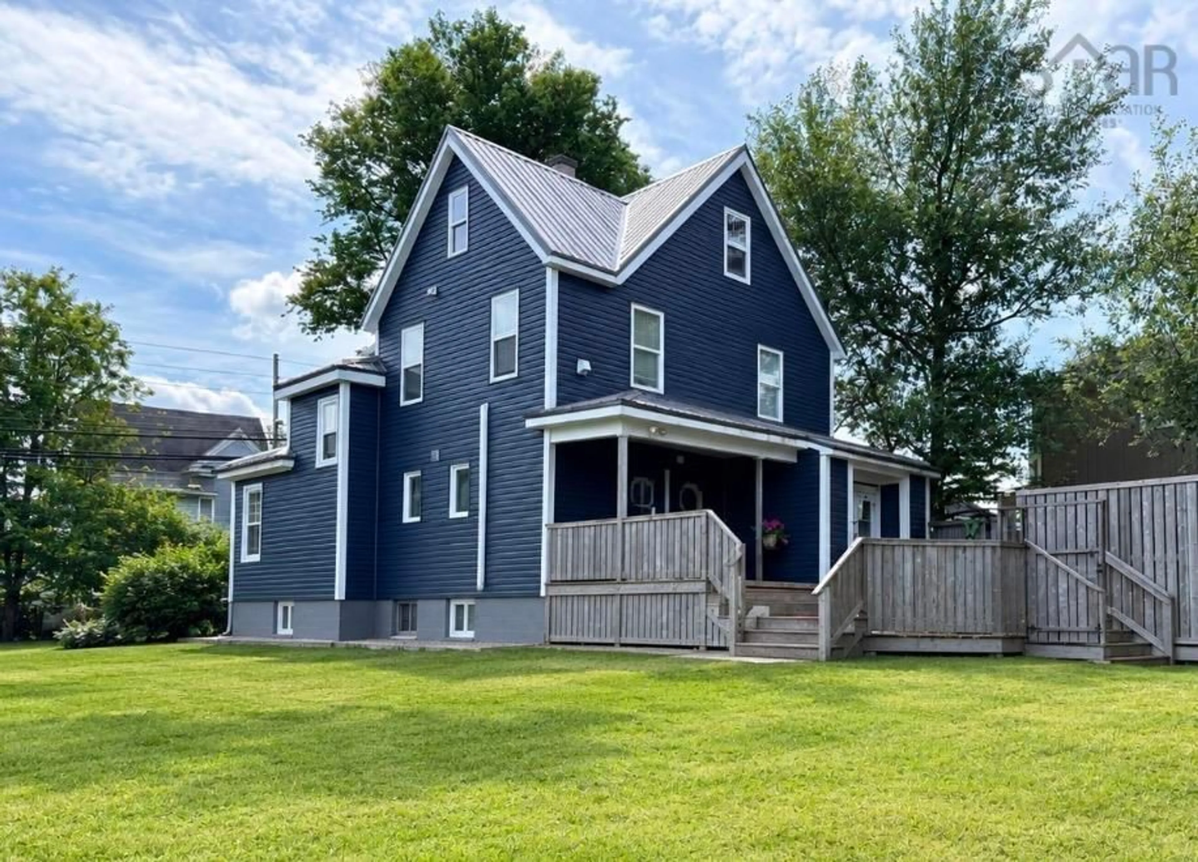 Home with vinyl exterior material, street for 830 Main St, Glace Bay Nova Scotia B1A 4Z4