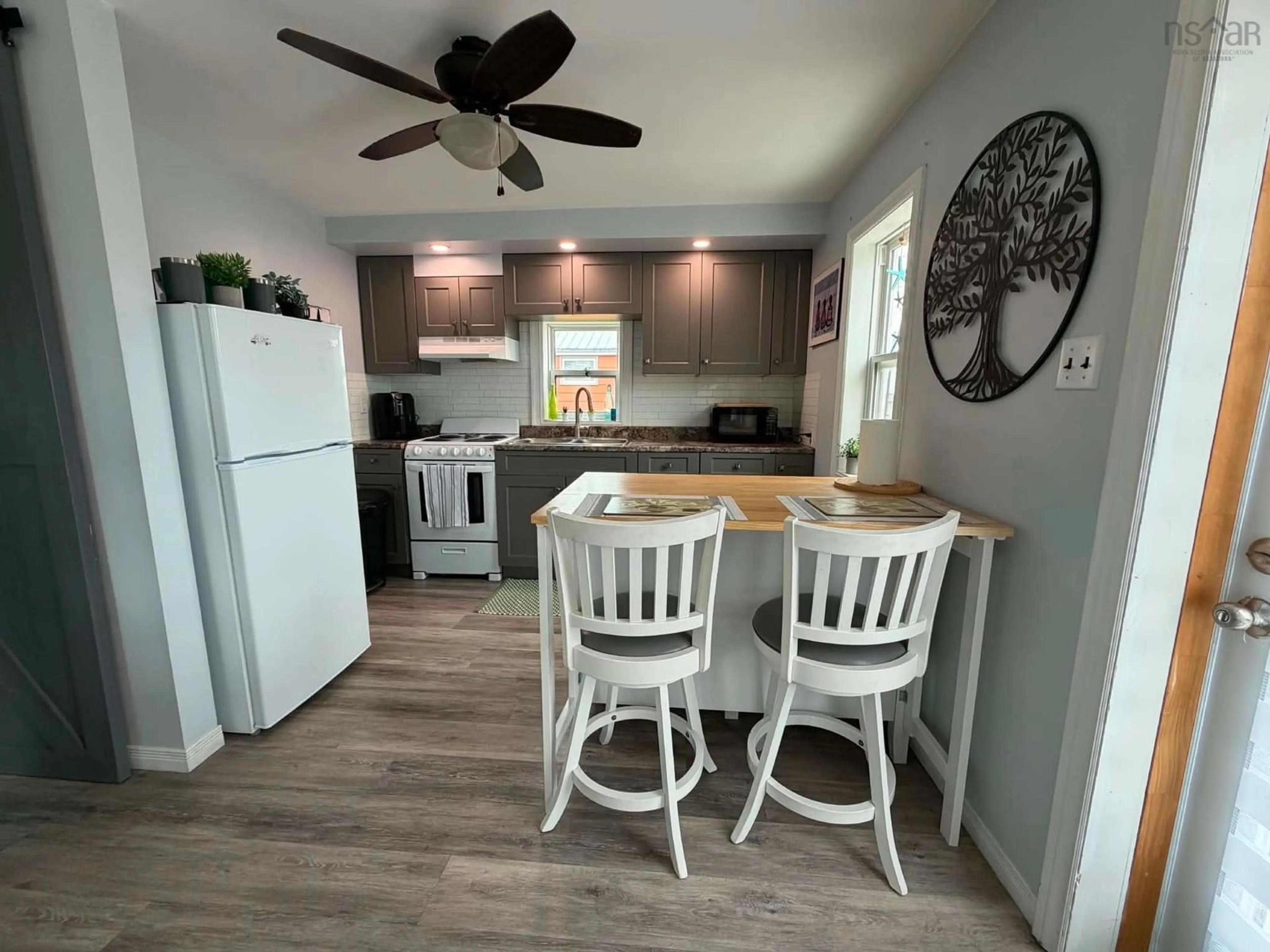 Open concept kitchen, unknown for 15330 Cabot Trail, Chéticamp Nova Scotia B0E 1H0