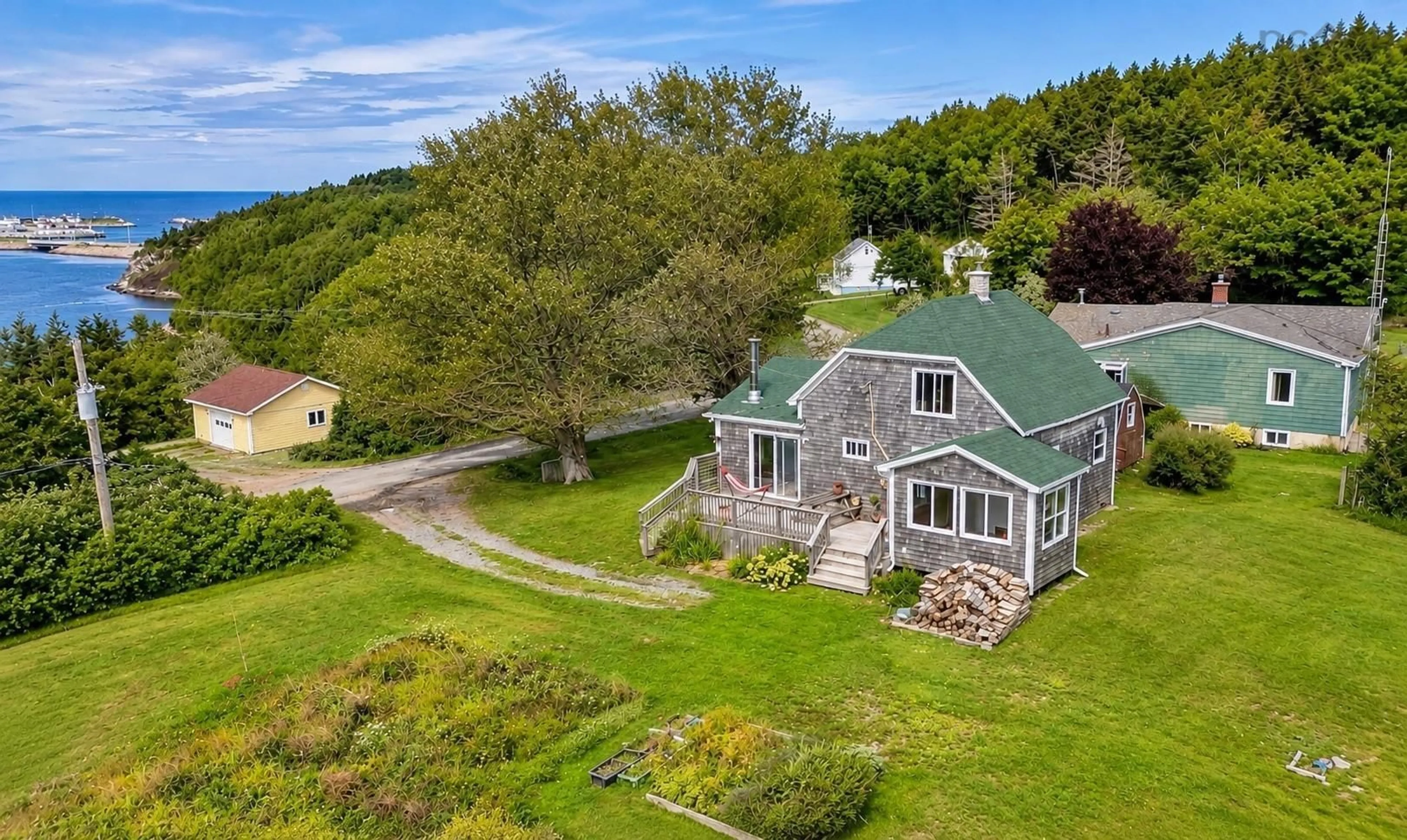 A pic from outside/outdoor area/front of a property/back of a property/a pic from drone, unknown for 1286 Chemin Macgarry Rd, Grand Étang Nova Scotia B0E 1L0