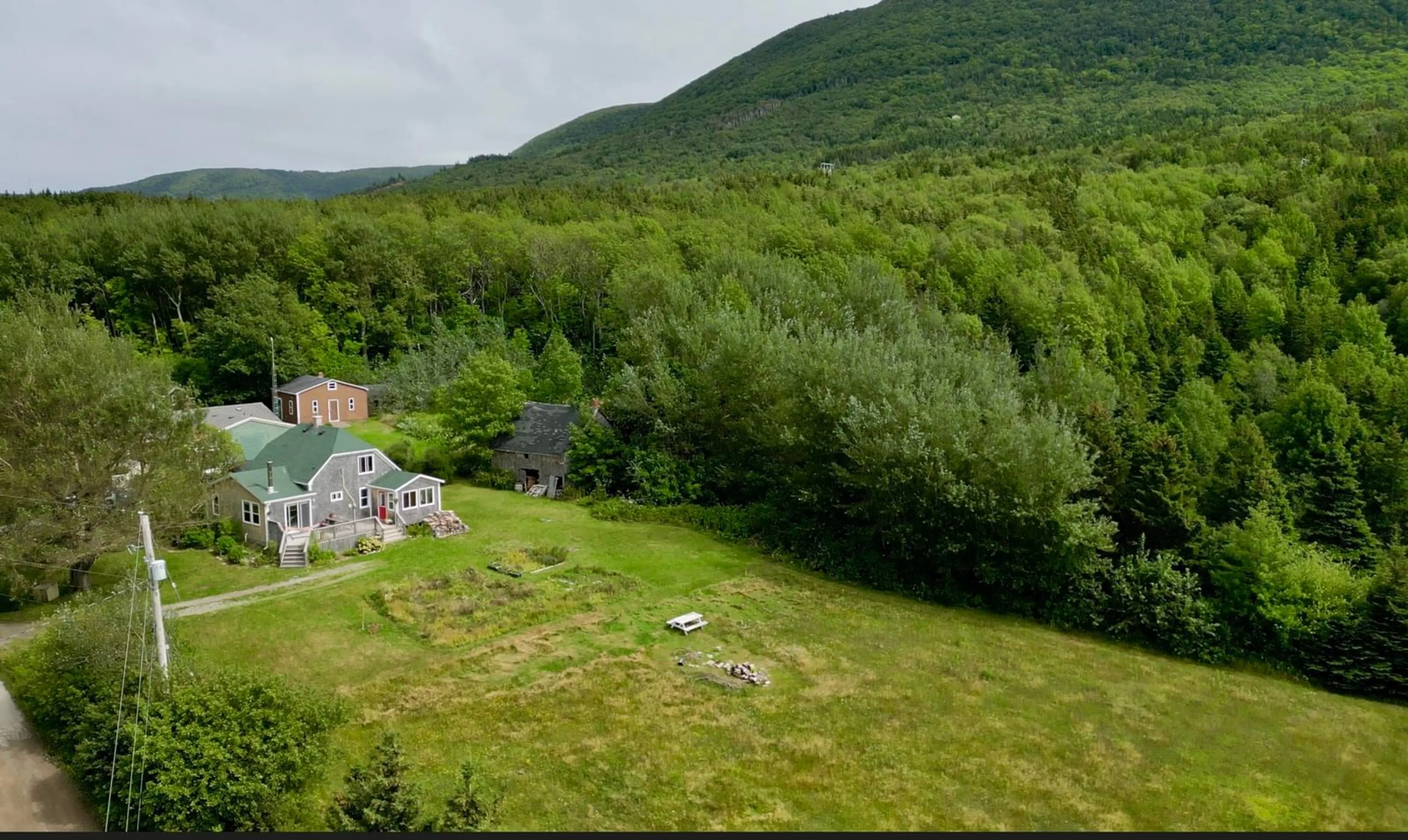 A pic from outside/outdoor area/front of a property/back of a property/a pic from drone, mountain view for 1286 Chemin Macgarry Rd, Grand Étang Nova Scotia B0E 1L0
