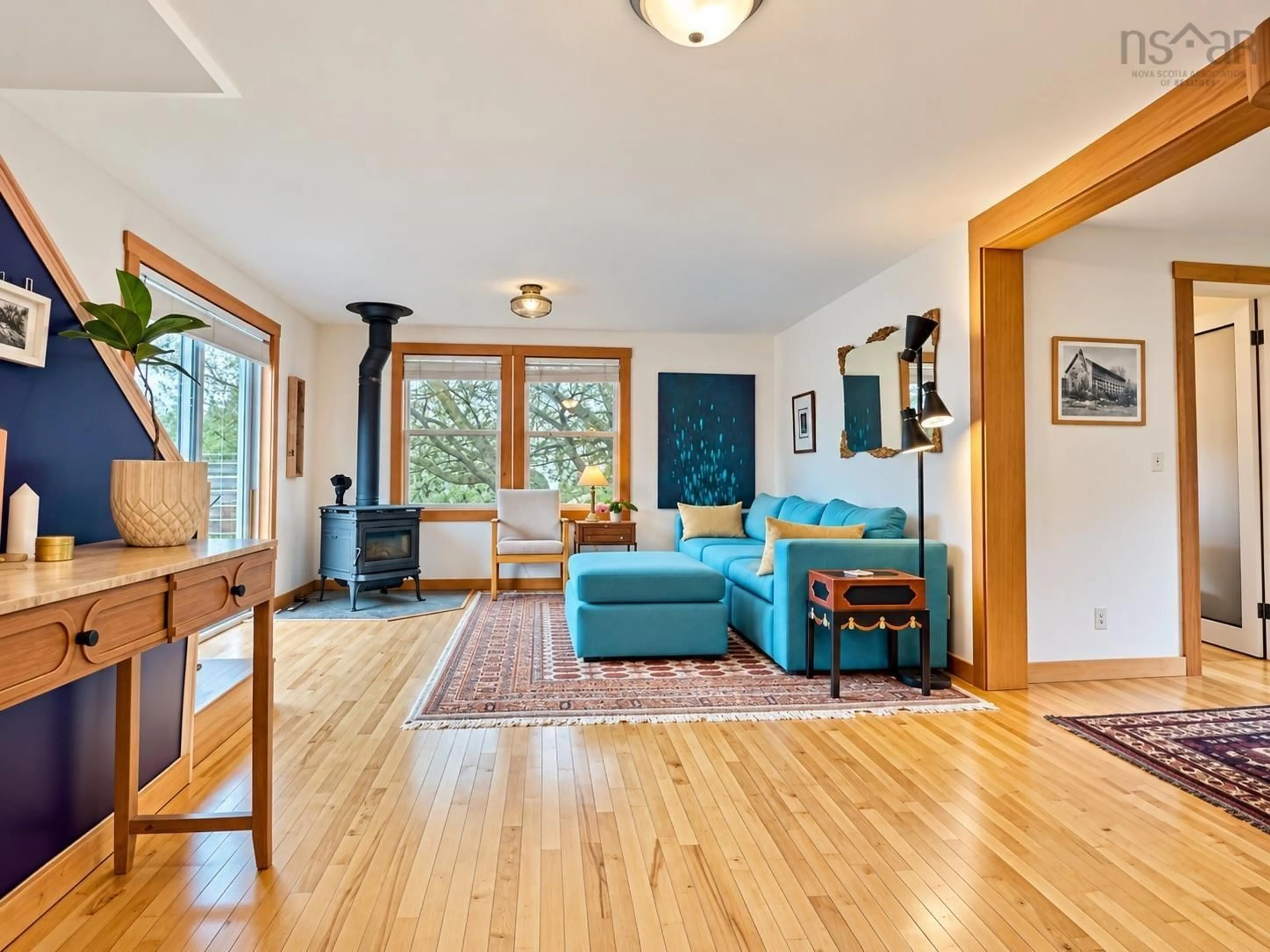 Living room with furniture, wood/laminate floor for 1286 Chemin Macgarry Rd, Grand Étang Nova Scotia B0E 1L0