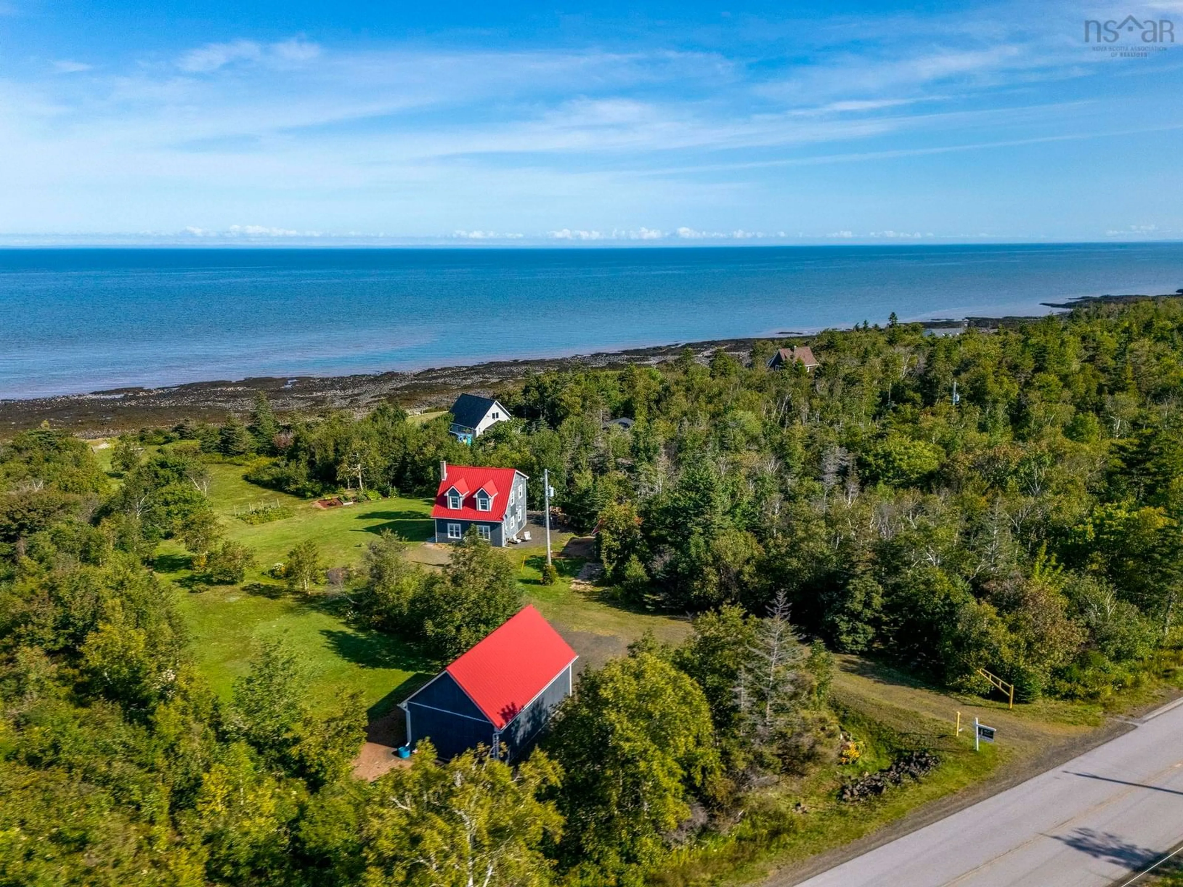 A pic from outside/outdoor area/front of a property/back of a property/a pic from drone, water/lake/river/ocean view for 6437 Shore Road West, Youngs Cove Nova Scotia B0S 1L0