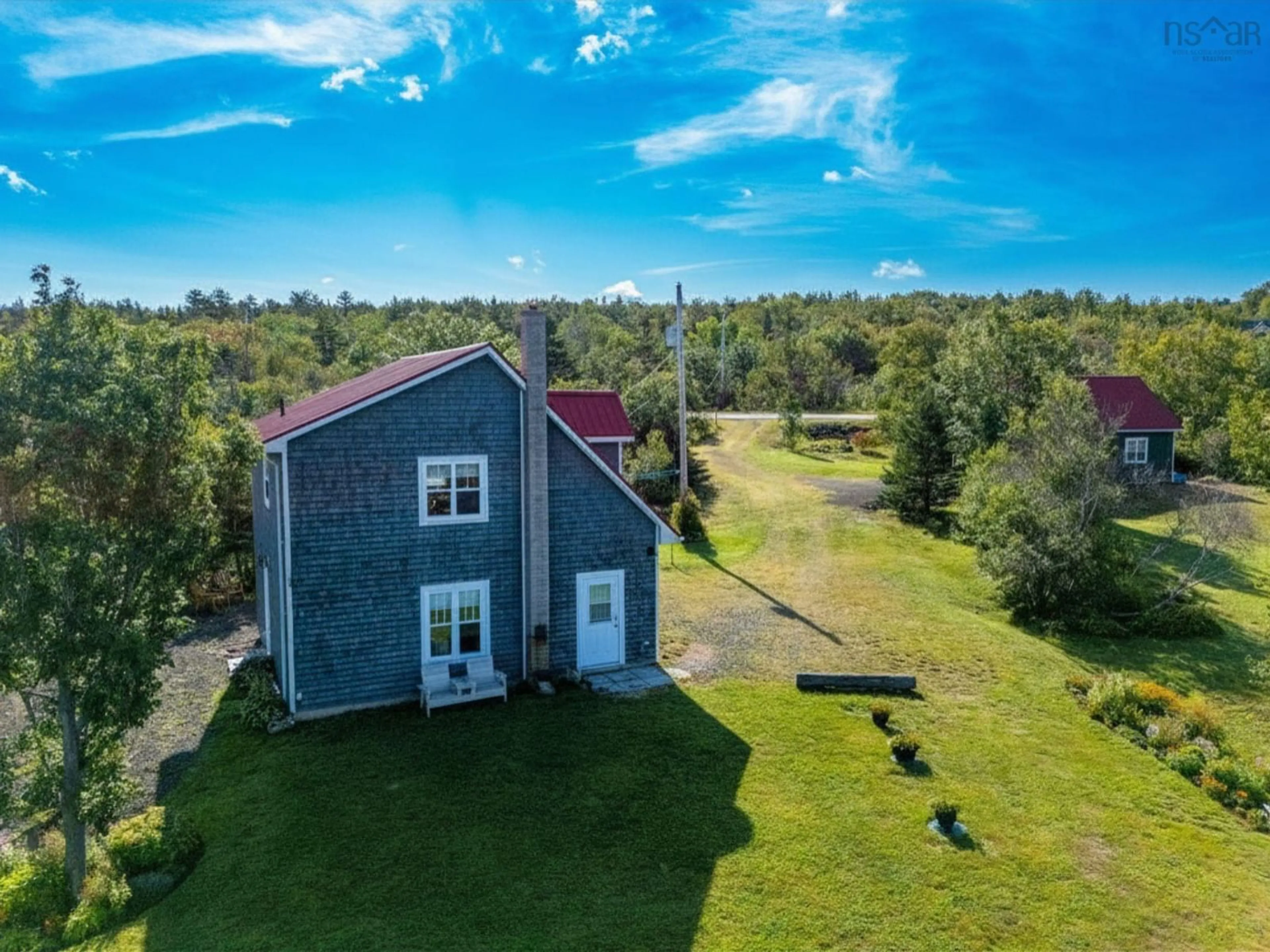 A pic from outside/outdoor area/front of a property/back of a property/a pic from drone, water/lake/river/ocean view for 6437 Shore Road West, Youngs Cove Nova Scotia B0S 1L0