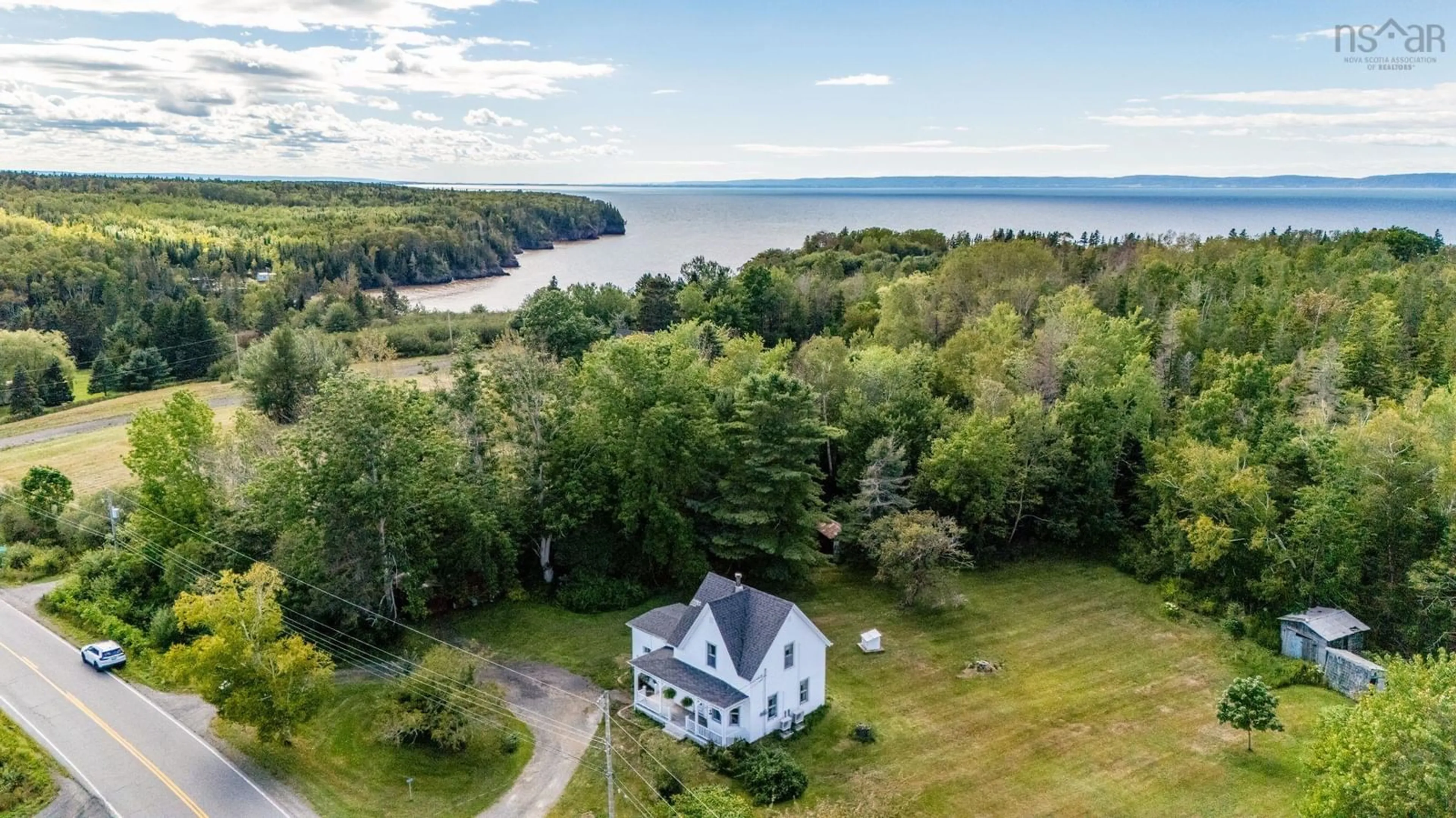 A pic from outside/outdoor area/front of a property/back of a property/a pic from drone, water/lake/river/ocean view for 7613 Highway 215, Cambridge Nova Scotia B0N 2R0