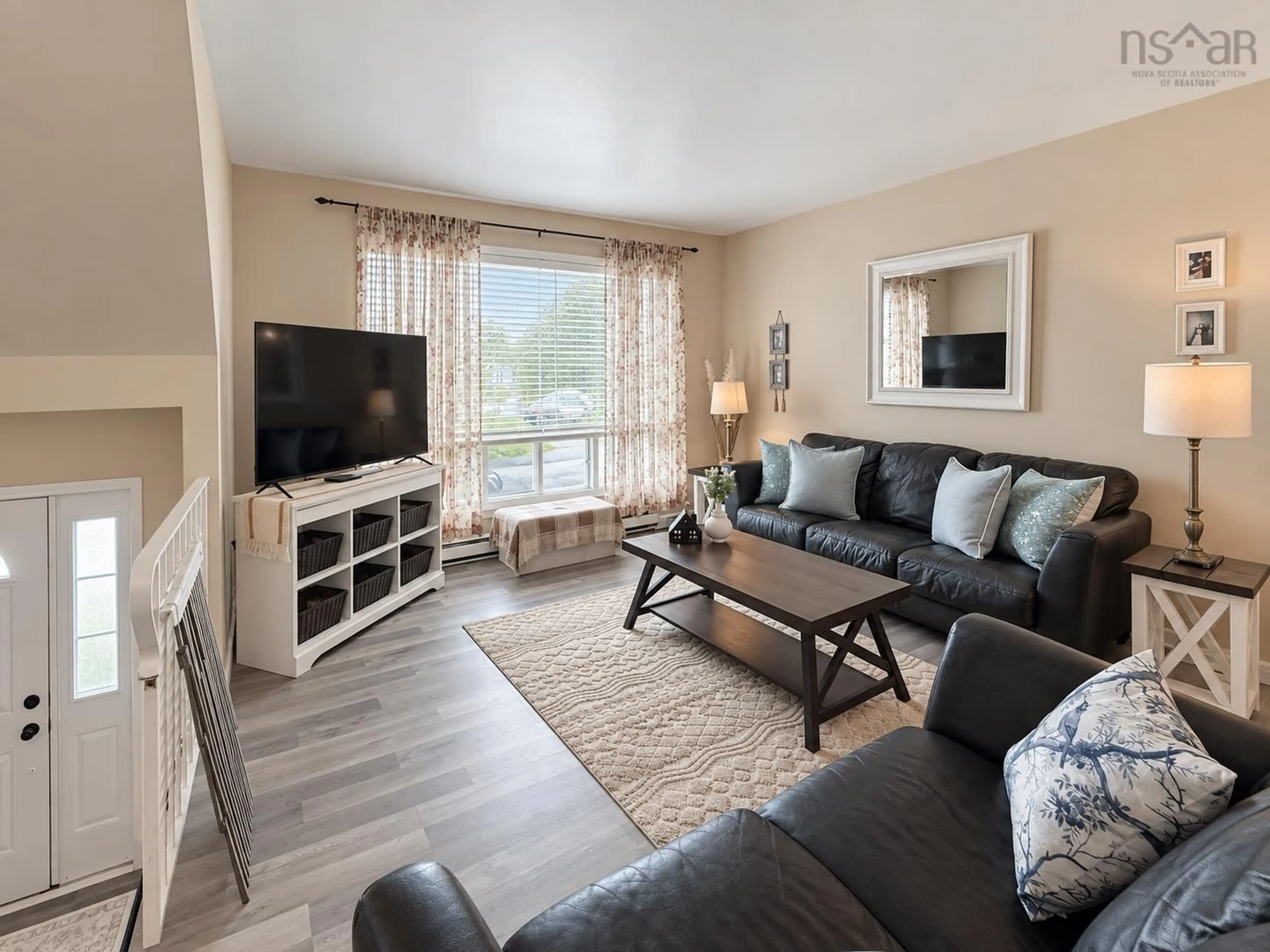 Living room with furniture, wood/laminate floor for 58 Hartlen Ave, Spryfield Nova Scotia B3R 1R6