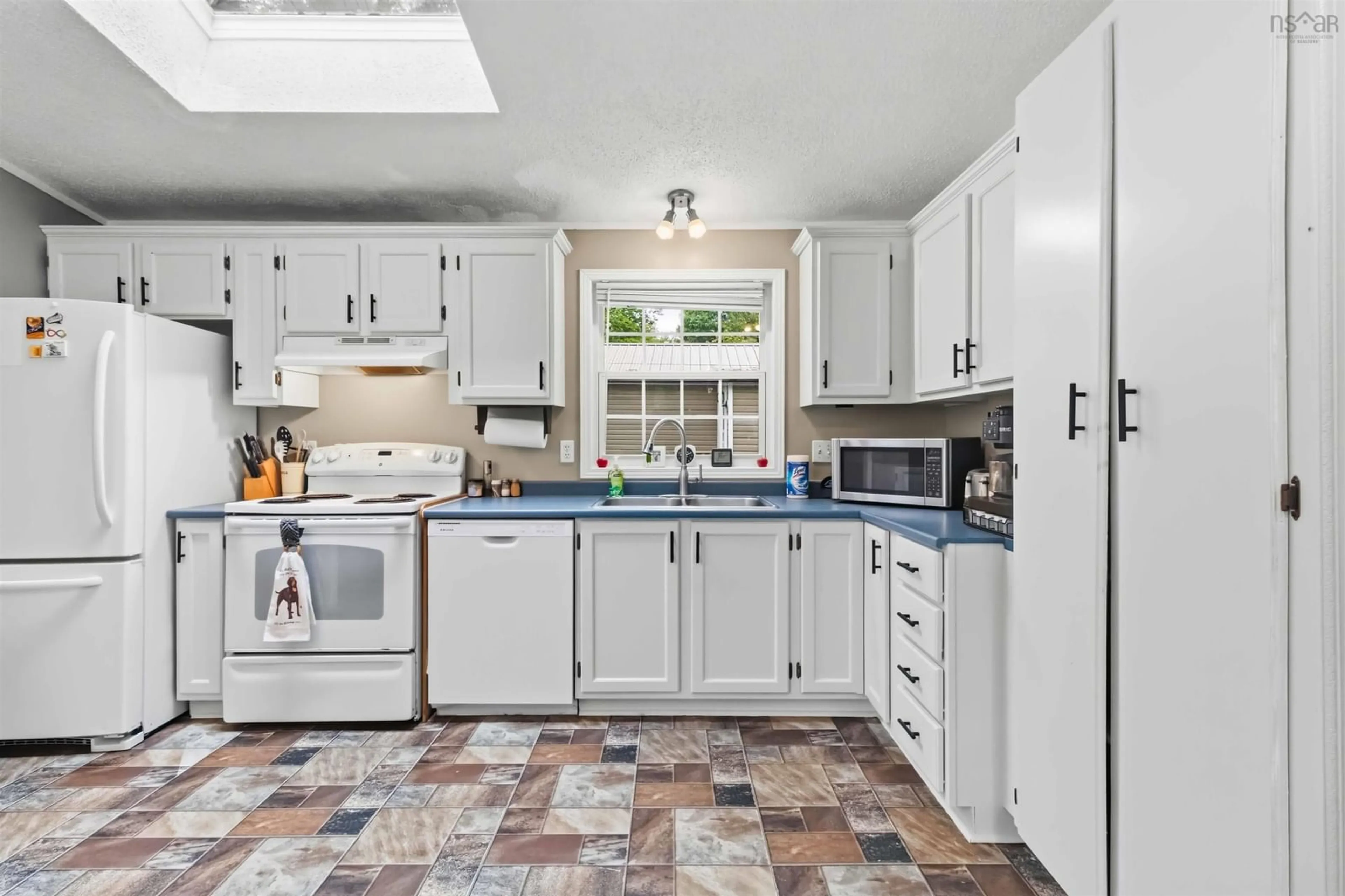 Standard kitchen, ceramic/tile floor for 53 Water St, Wileville Nova Scotia B4V 5K1