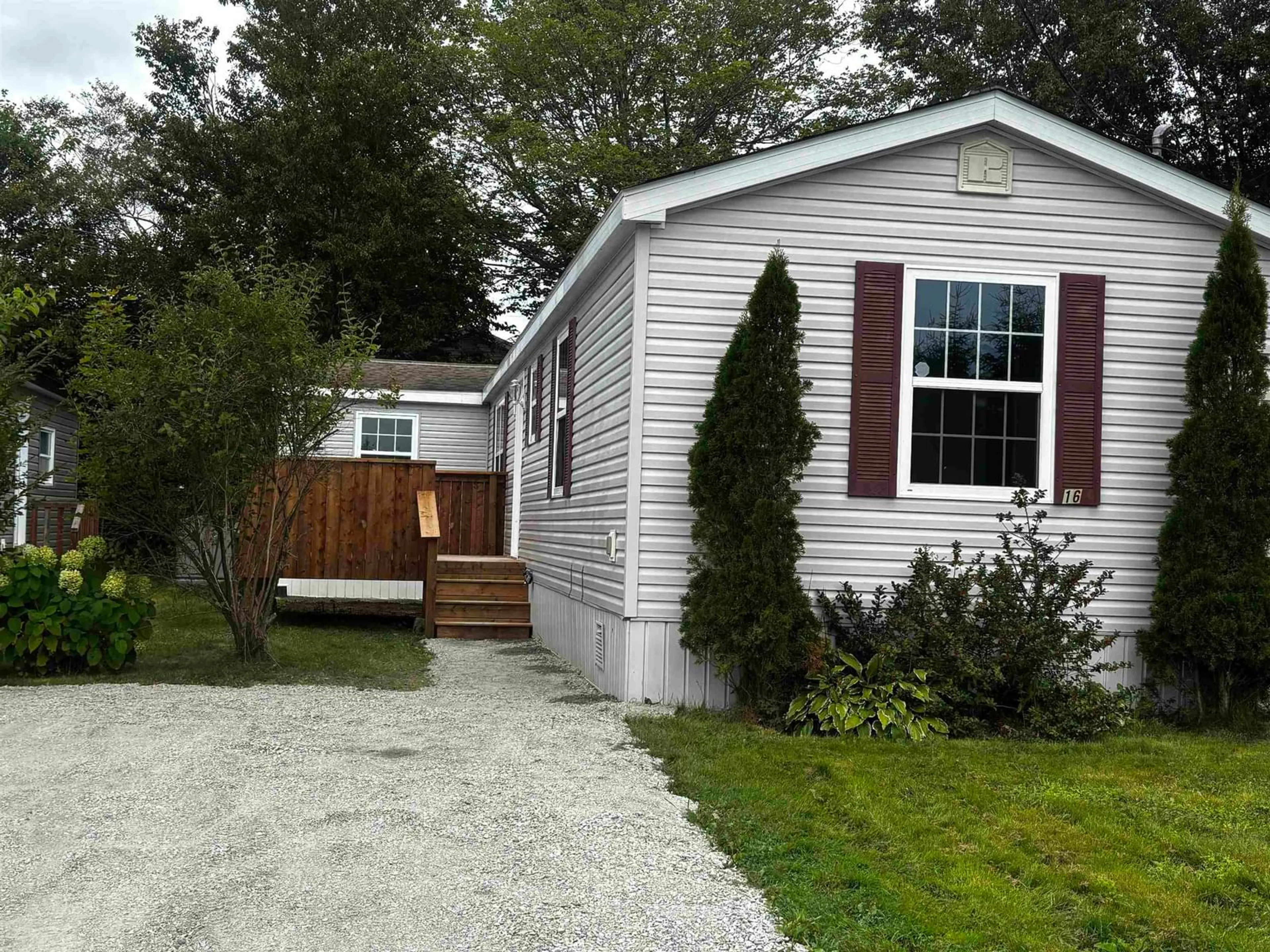 Home with vinyl exterior material, street for 16 Happy Dr, Lake Echo Nova Scotia B3E 1C4