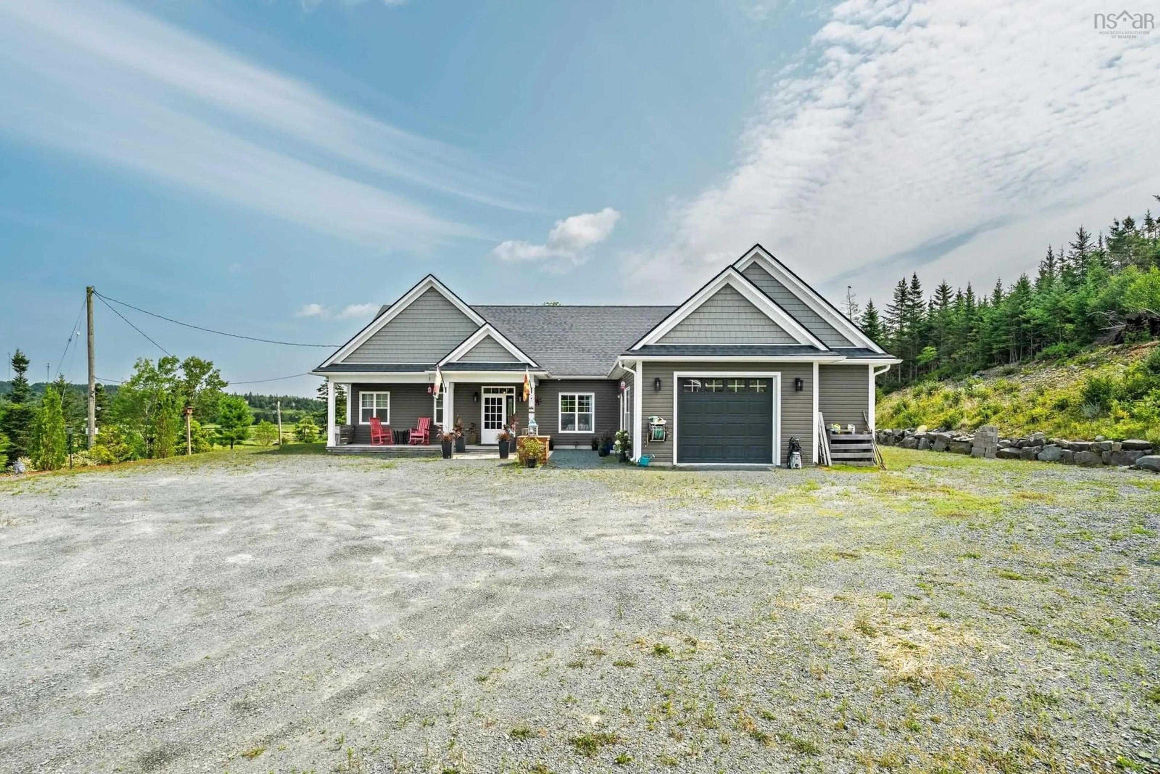 A pic from outside/outdoor area/front of a property/back of a property/a pic from drone, unknown for 395 Shore Rd, West Chezzetcook Nova Scotia B0J 2L0