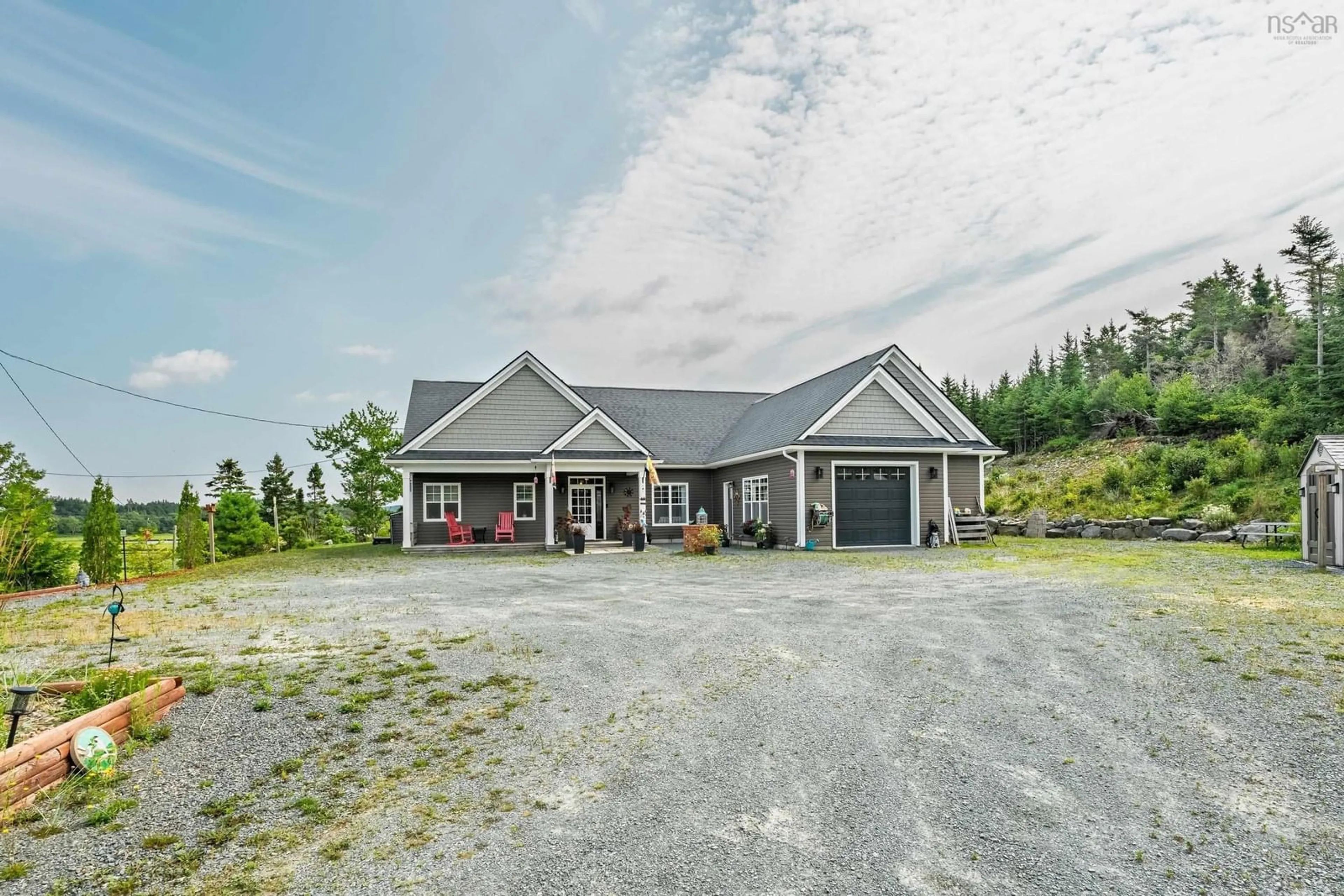 A pic from outside/outdoor area/front of a property/back of a property/a pic from drone, unknown for 395 Shore Rd, West Chezzetcook Nova Scotia B0J 2L0