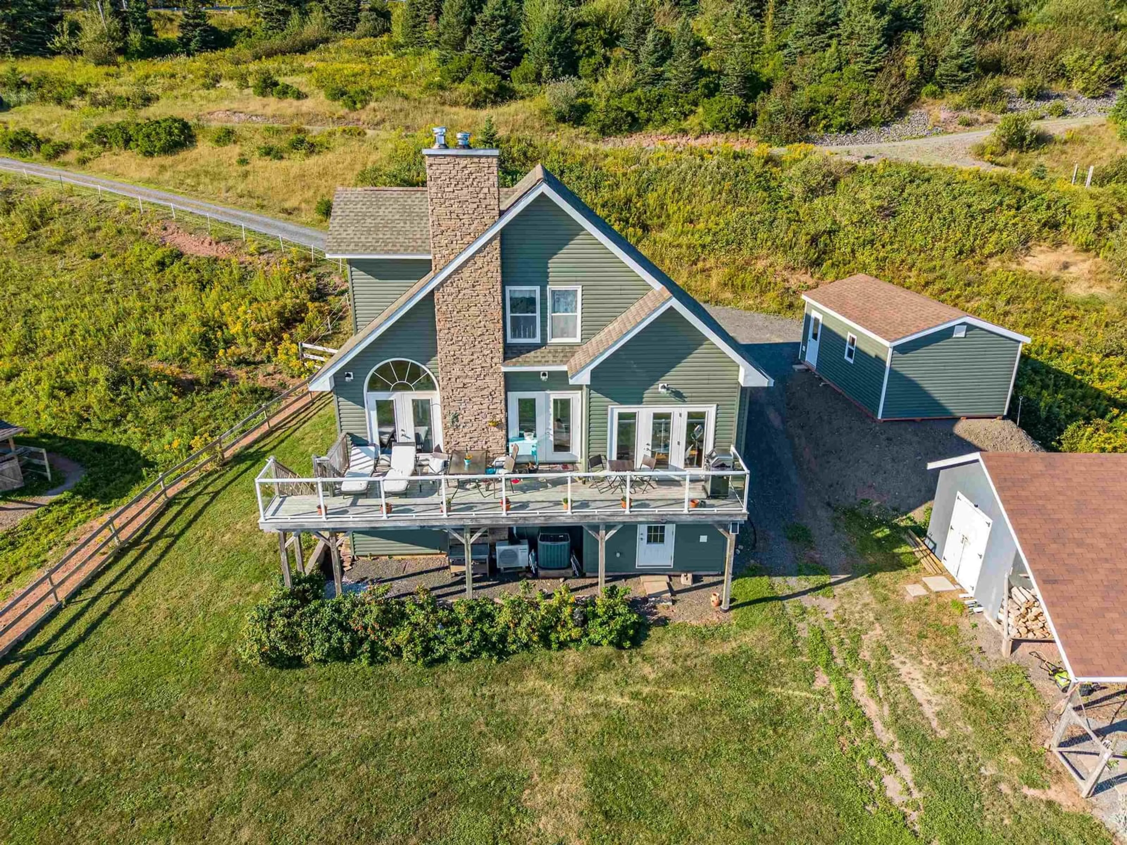 A pic from outside/outdoor area/front of a property/back of a property/a pic from drone, water/lake/river/ocean view for 6440 Highway 337, Cape George Point Nova Scotia B2G 2L2
