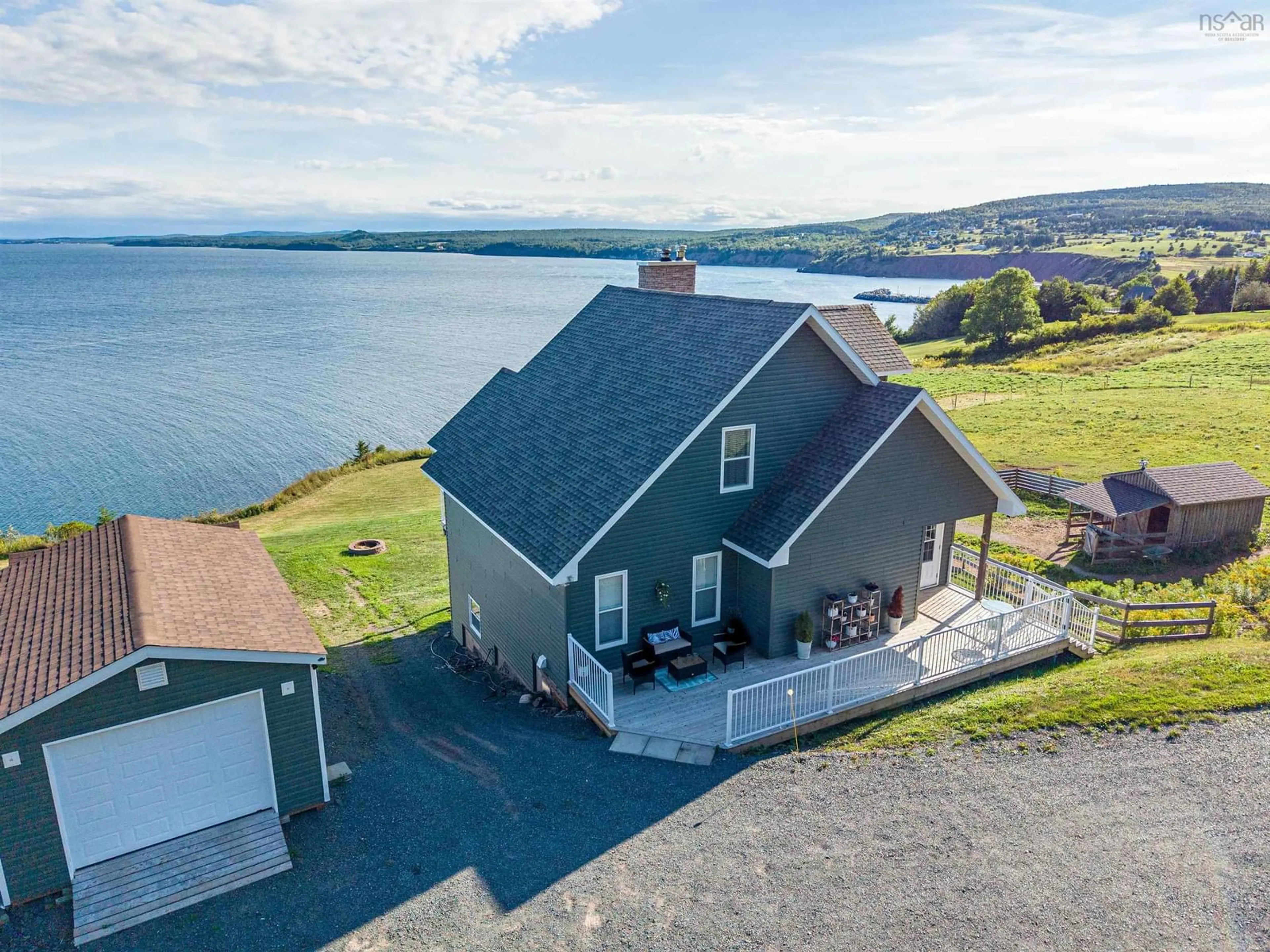 A pic from outside/outdoor area/front of a property/back of a property/a pic from drone, water/lake/river/ocean view for 6440 Highway 337, Cape George Point Nova Scotia B2G 2L2