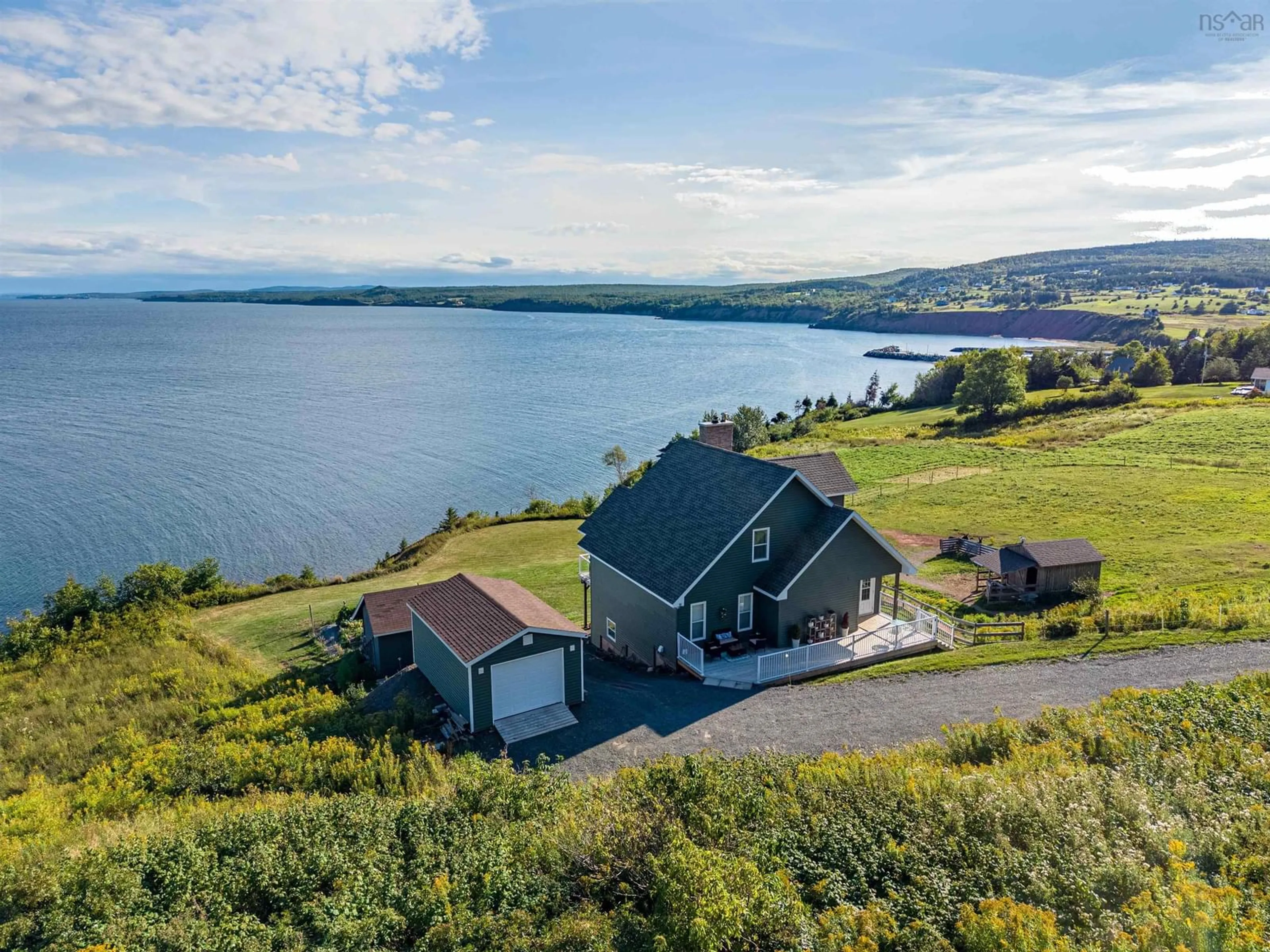 A pic from outside/outdoor area/front of a property/back of a property/a pic from drone, water/lake/river/ocean view for 6440 Highway 337, Cape George Point Nova Scotia B2G 2L2