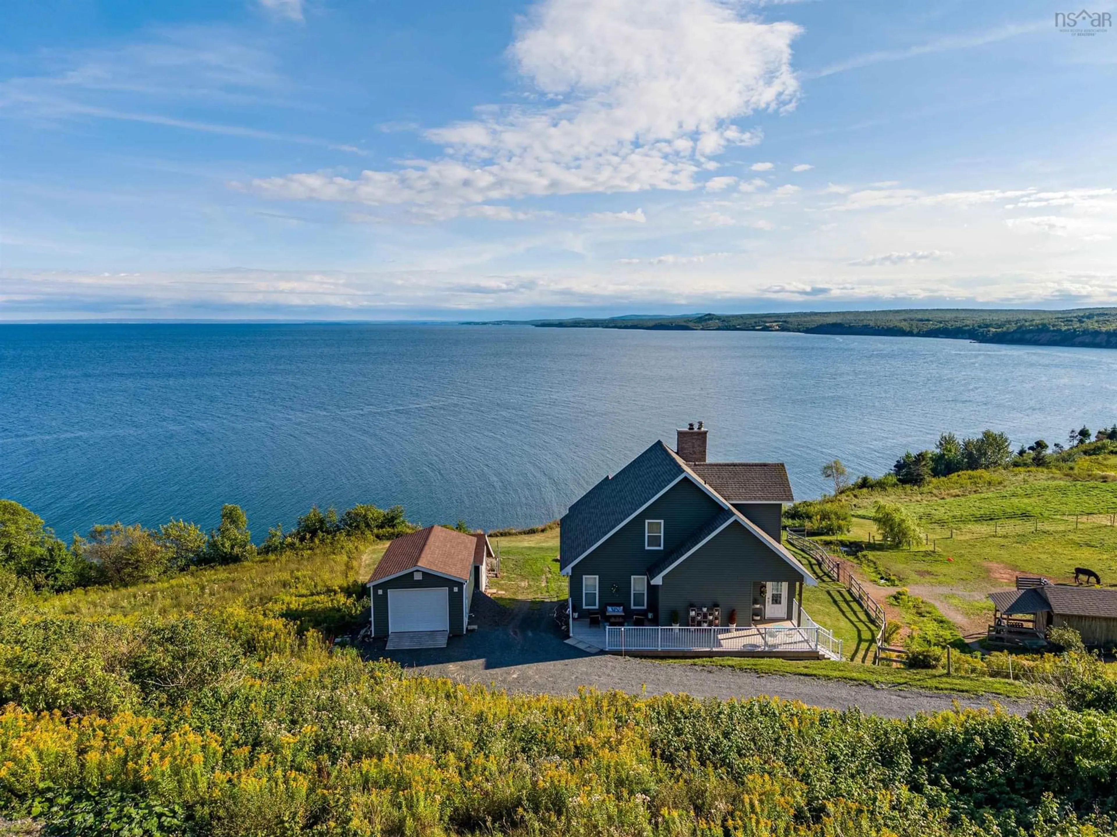 A pic from outside/outdoor area/front of a property/back of a property/a pic from drone, water/lake/river/ocean view for 6440 Highway 337, Cape George Point Nova Scotia B2G 2L2
