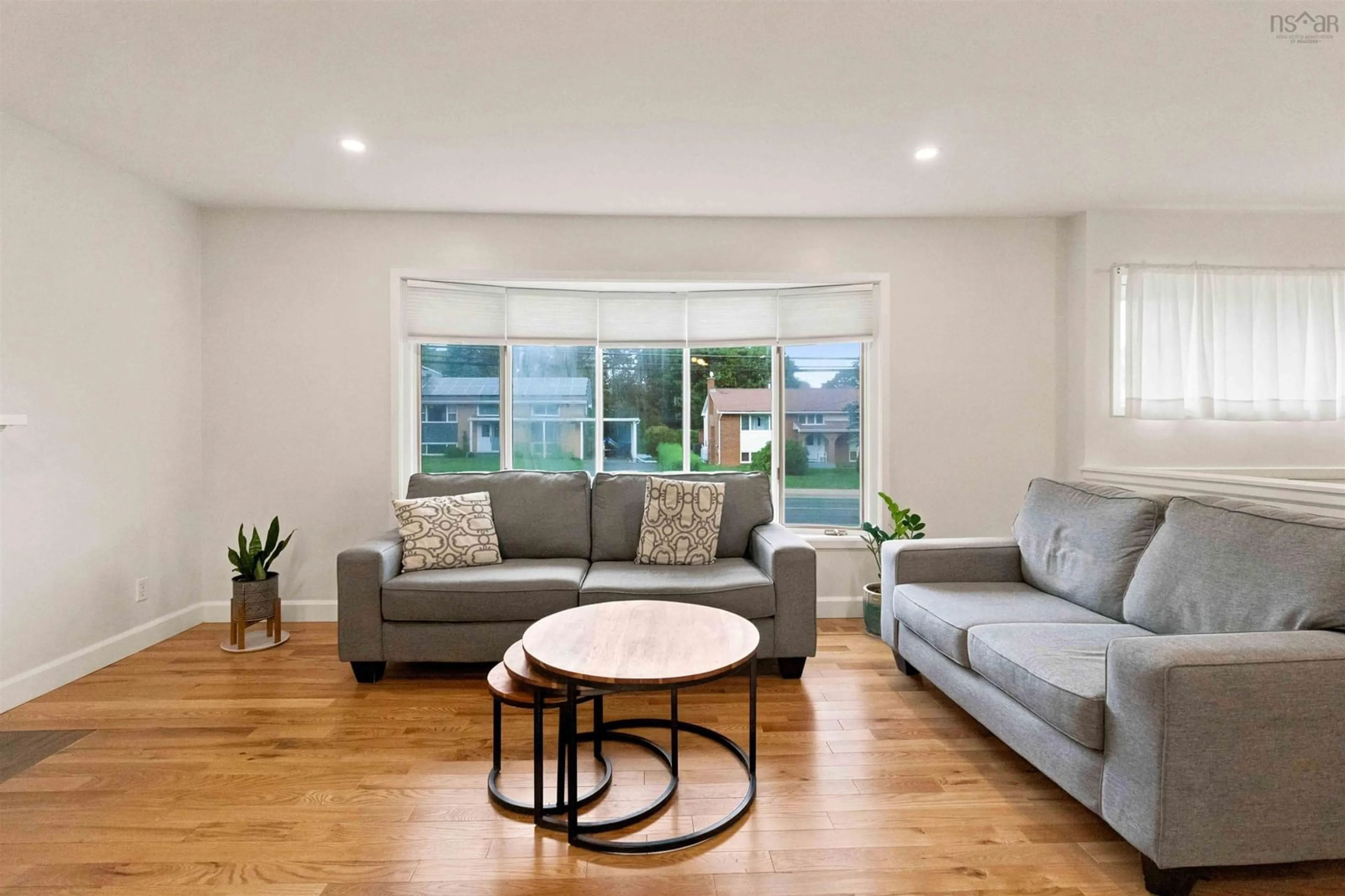 Living room with furniture, wood/laminate floor for 68 Flamingo Dr, Clayton Park Nova Scotia B3M 1T1