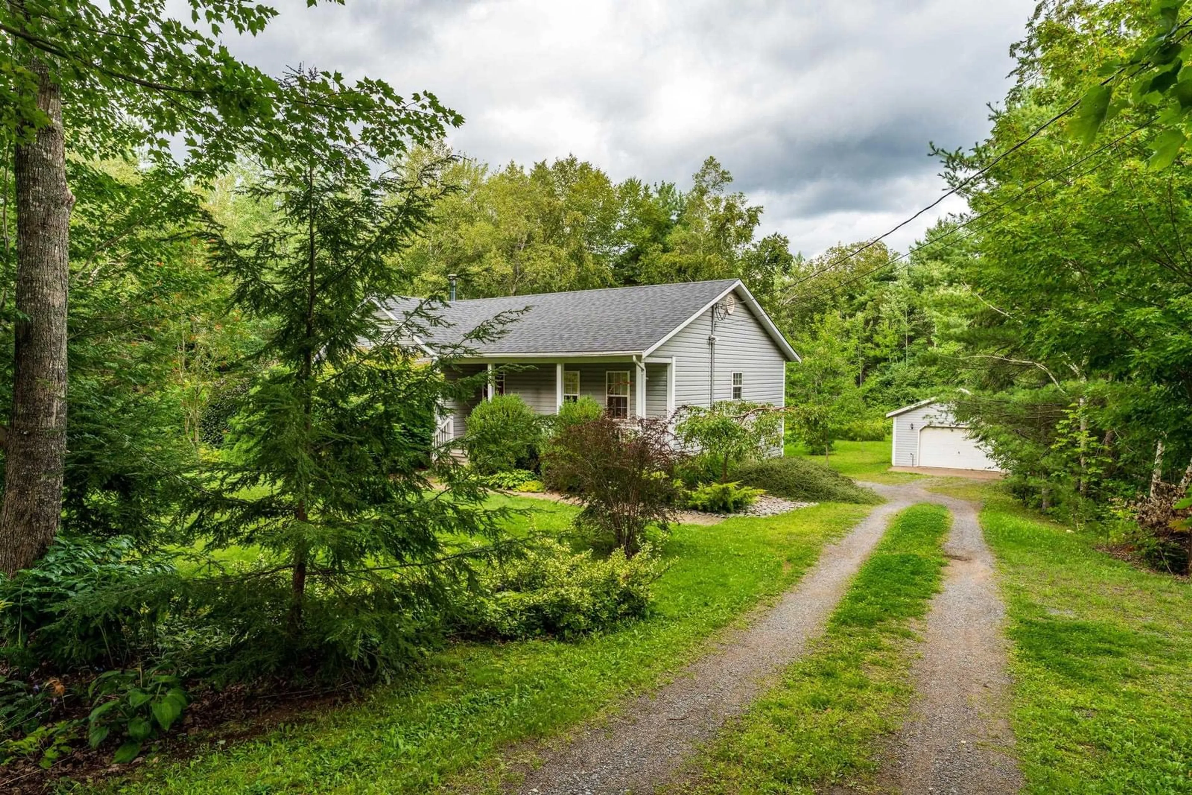 A pic from outside/outdoor area/front of a property/back of a property/a pic from drone, street for 75 Lawrence Rd, Windermere Nova Scotia B0P 1E0