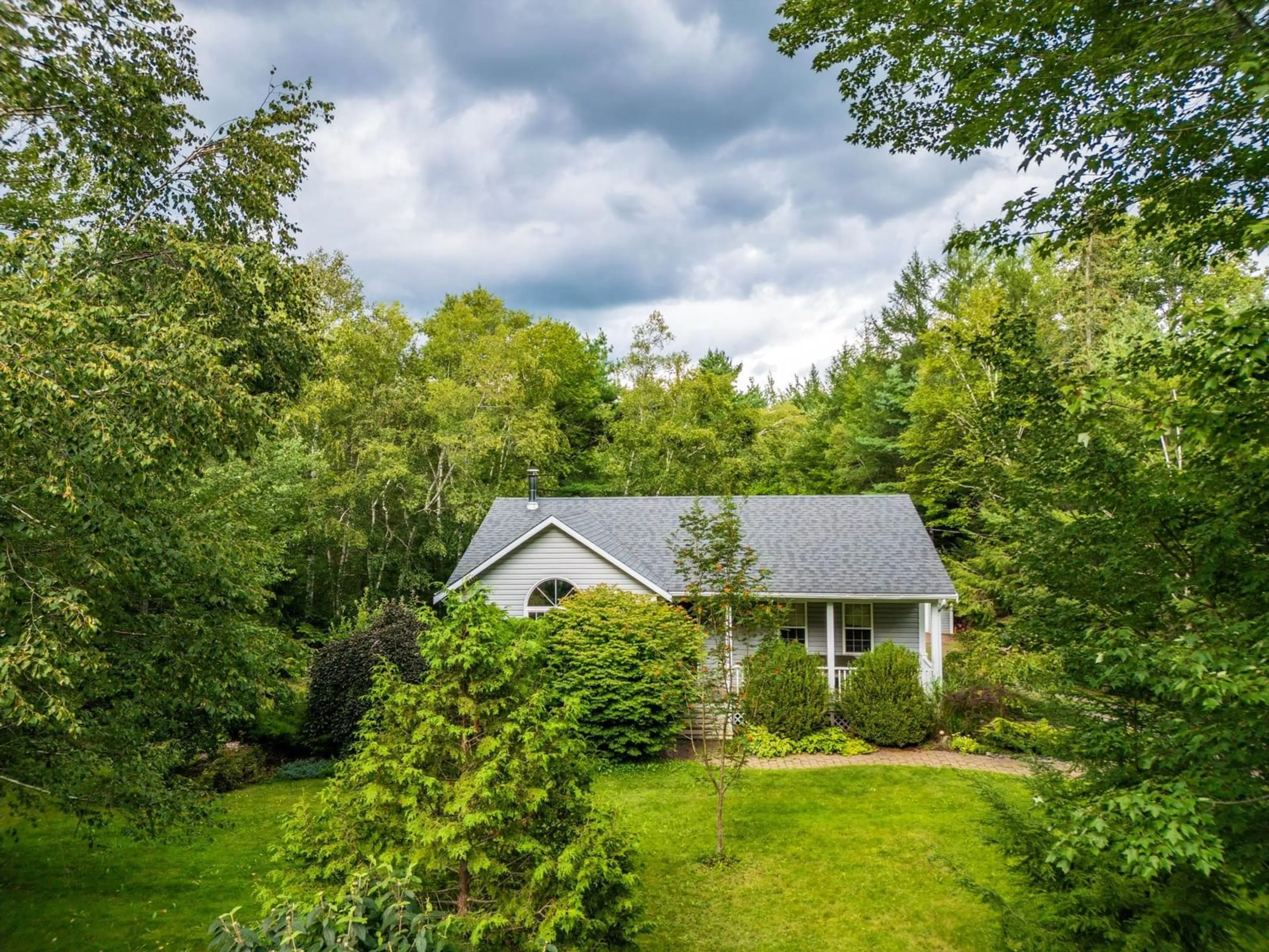 A pic from outside/outdoor area/front of a property/back of a property/a pic from drone, forest/trees view for 75 Lawrence Rd, Windermere Nova Scotia B0P 1E0
