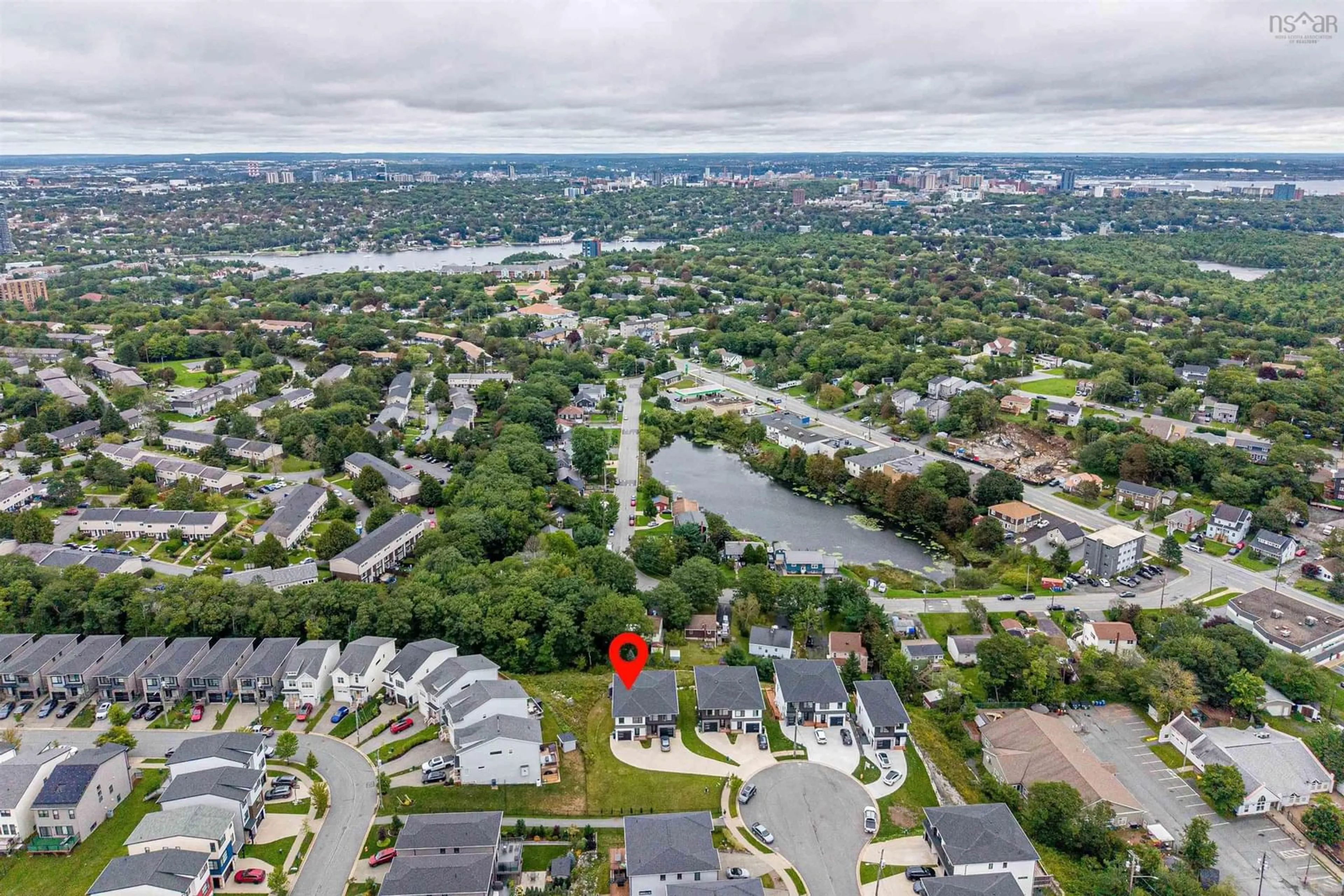A pic from outside/outdoor area/front of a property/back of a property/a pic from drone, water/lake/river/ocean view for 68 Grenoble Crt, Halifax Nova Scotia B3P 0J7