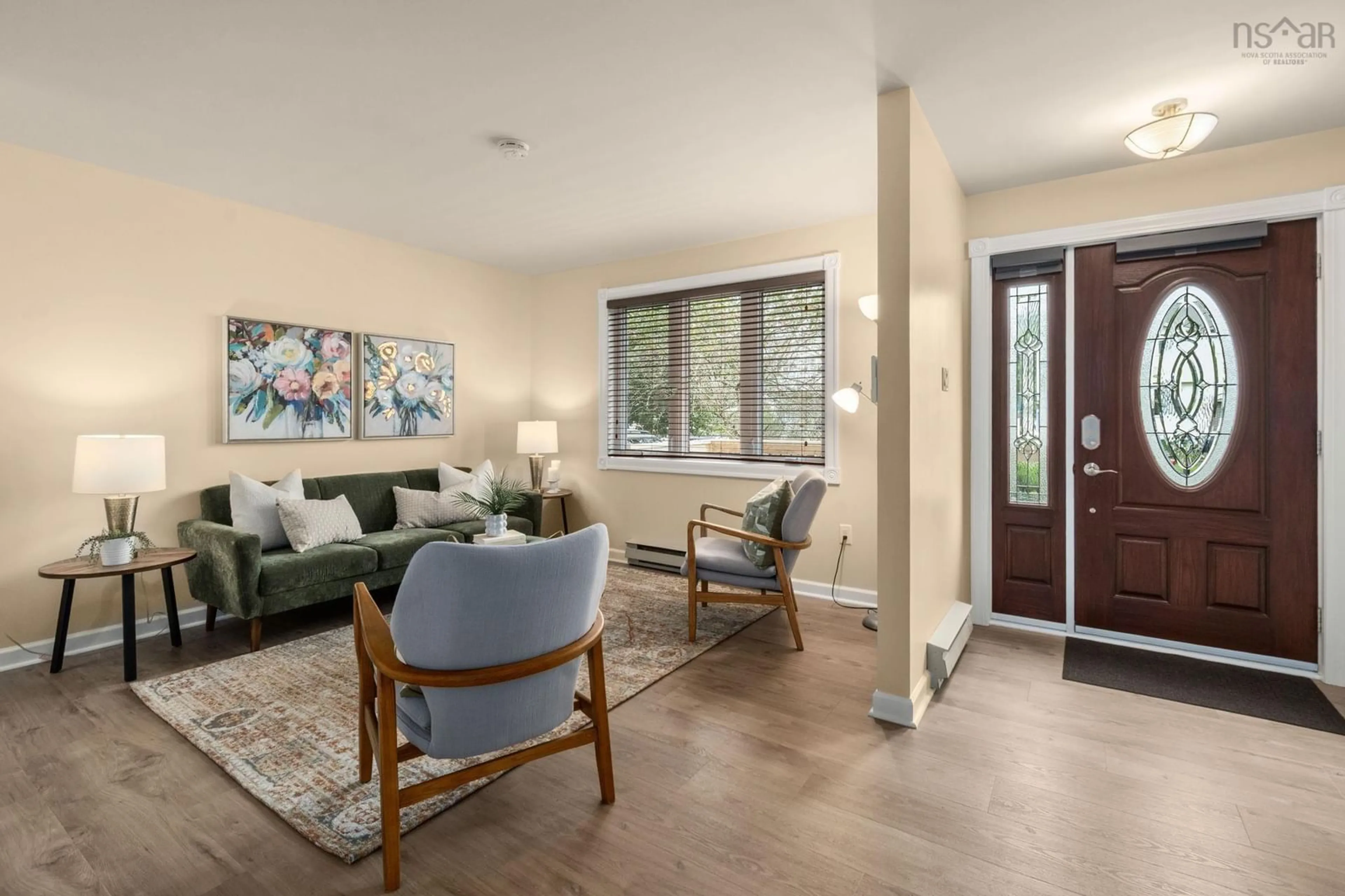 Living room with furniture, wood/laminate floor for 238 Greenwood Ave, Timberlea Nova Scotia B3T 1H8