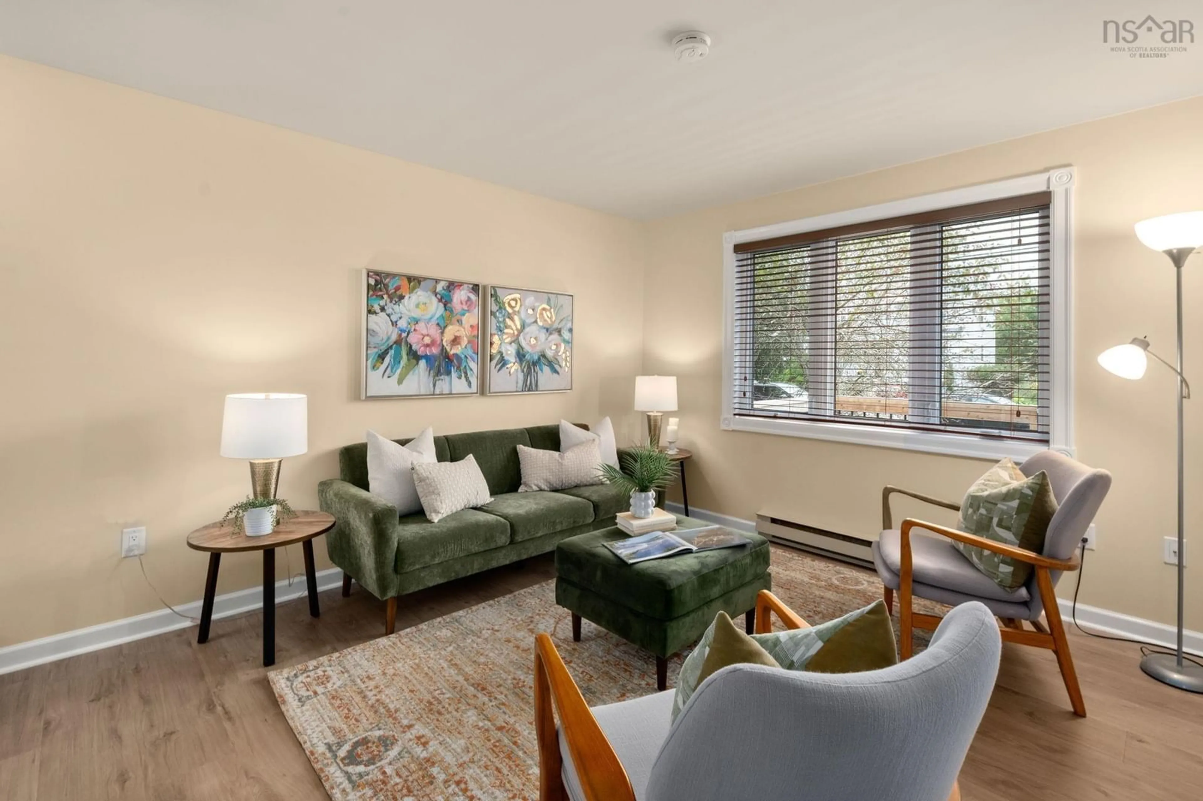 Living room with furniture, wood/laminate floor for 238 Greenwood Ave, Timberlea Nova Scotia B3T 1H8