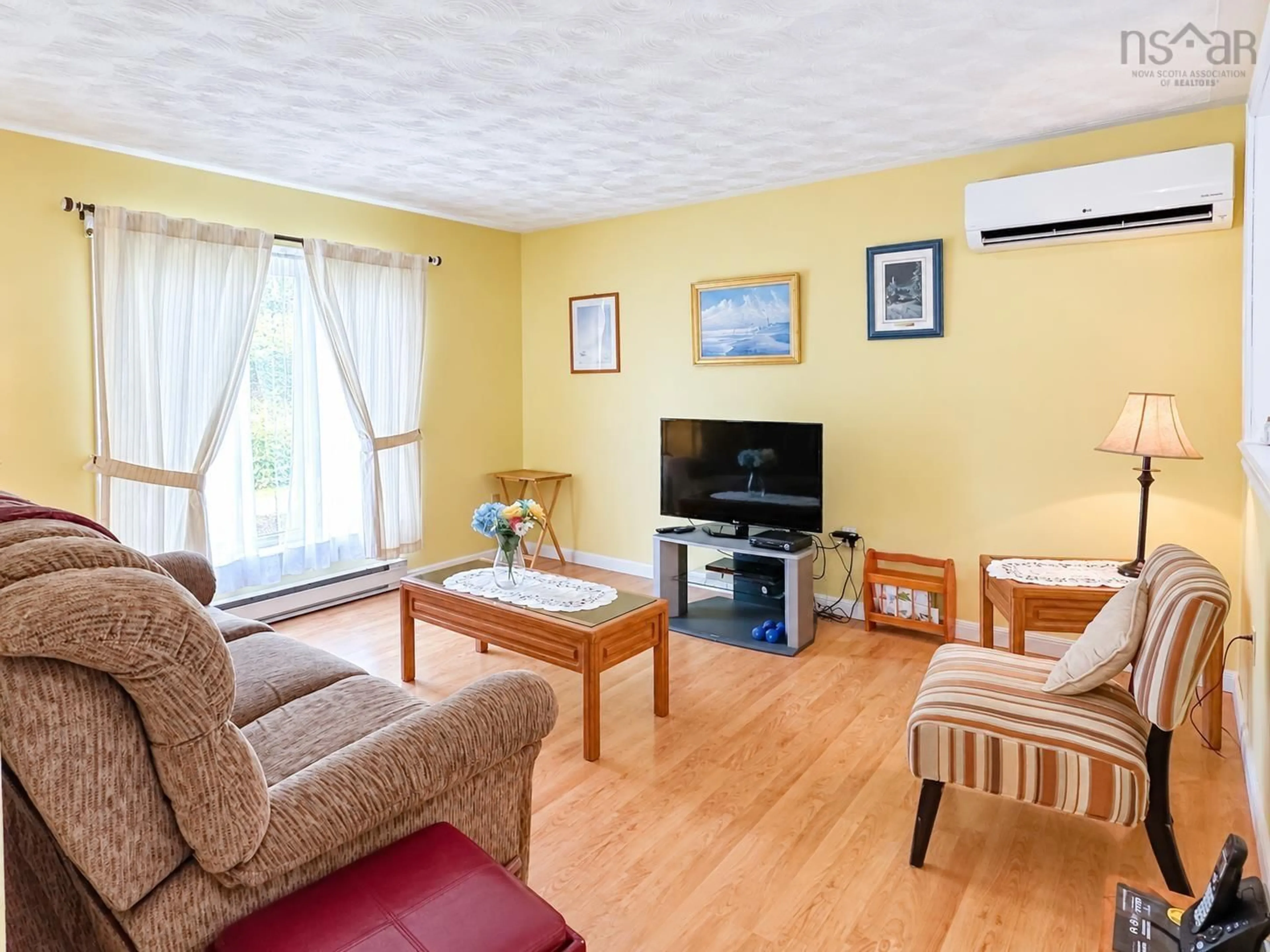 Living room with furniture, wood/laminate floor for 30 Sherry Ave, Kentville Nova Scotia B4N 1Z7