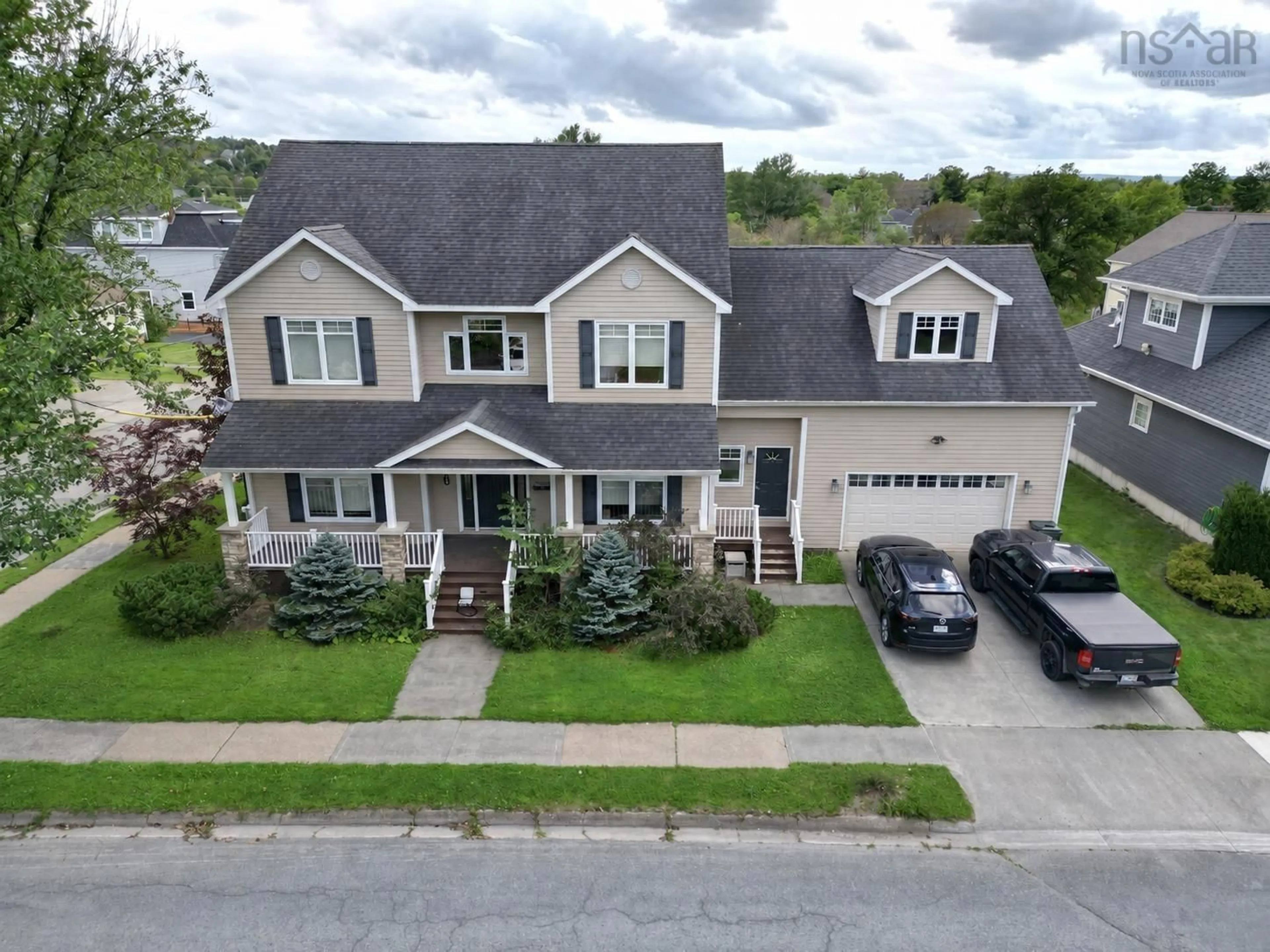 A pic from outside/outdoor area/front of a property/back of a property/a pic from drone, street for 74 Hospital St, Sydney Nova Scotia B1P 0C3