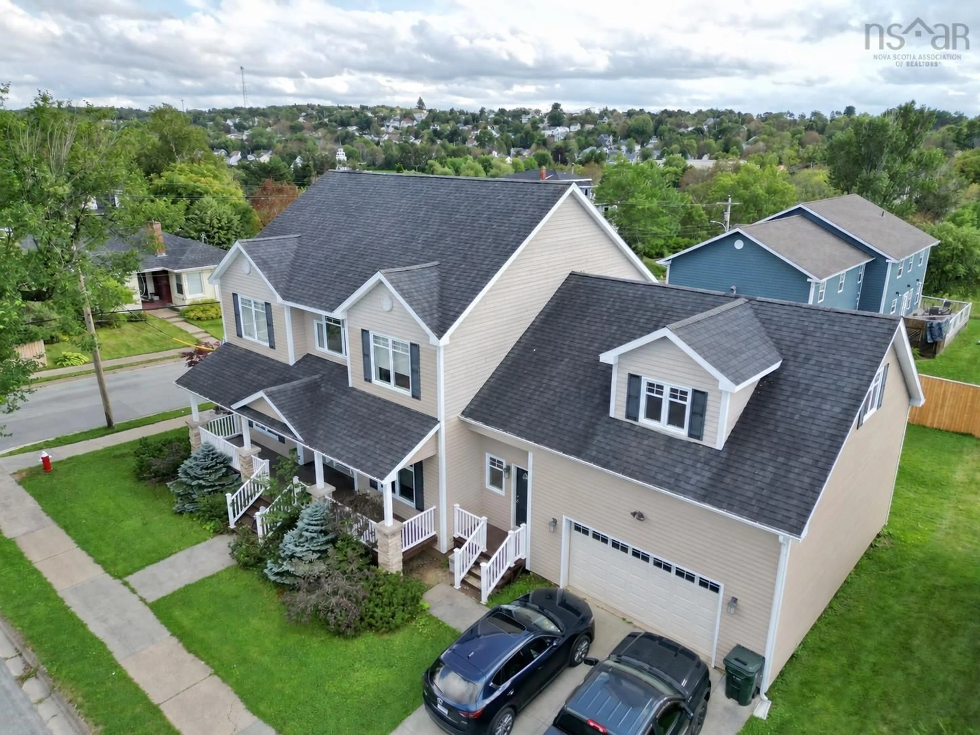A pic from outside/outdoor area/front of a property/back of a property/a pic from drone, street for 74 Hospital St, Sydney Nova Scotia B1P 0C3