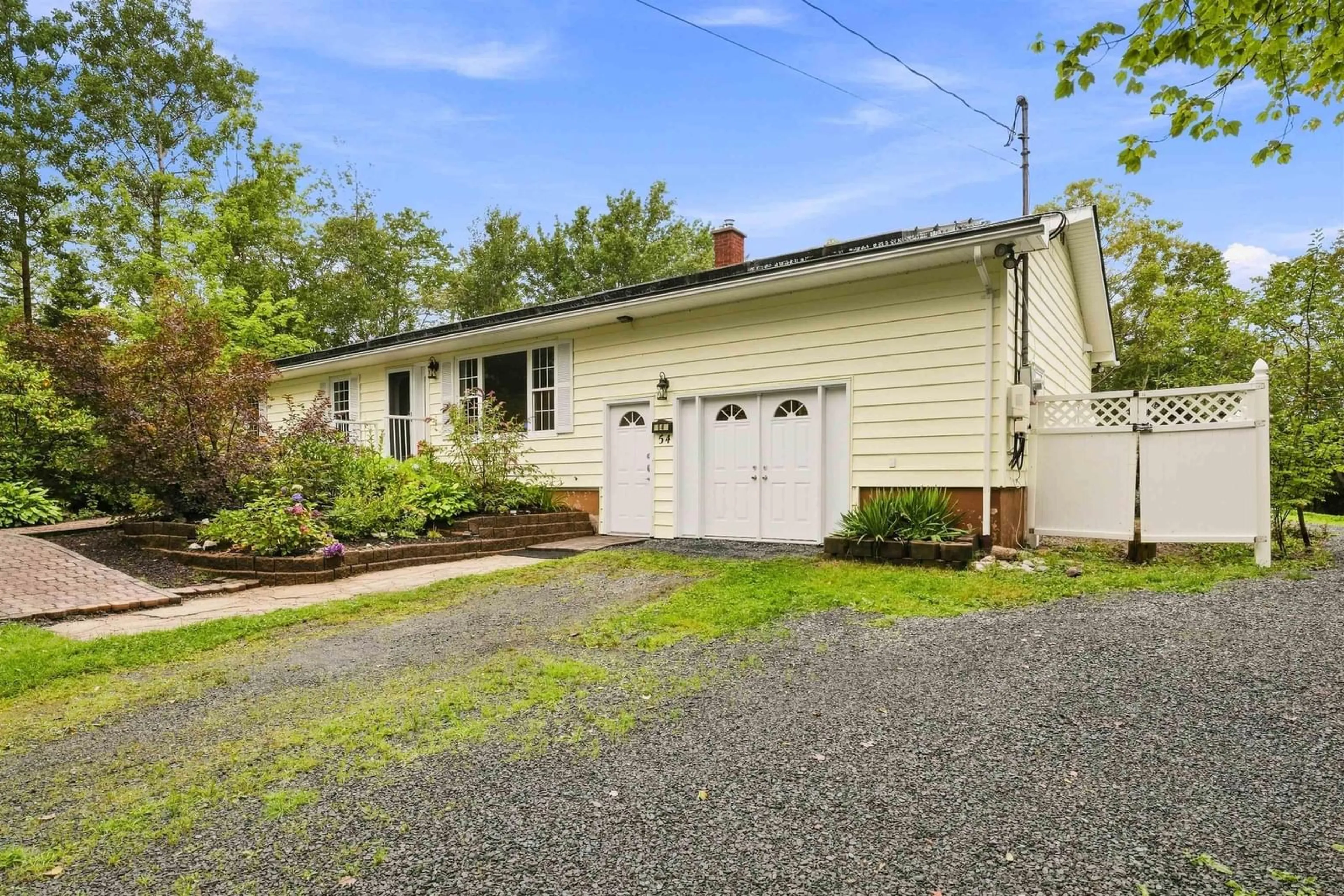 Home with vinyl exterior material, street for 54 Parker Lane, Porters Lake Nova Scotia B3E 1E5