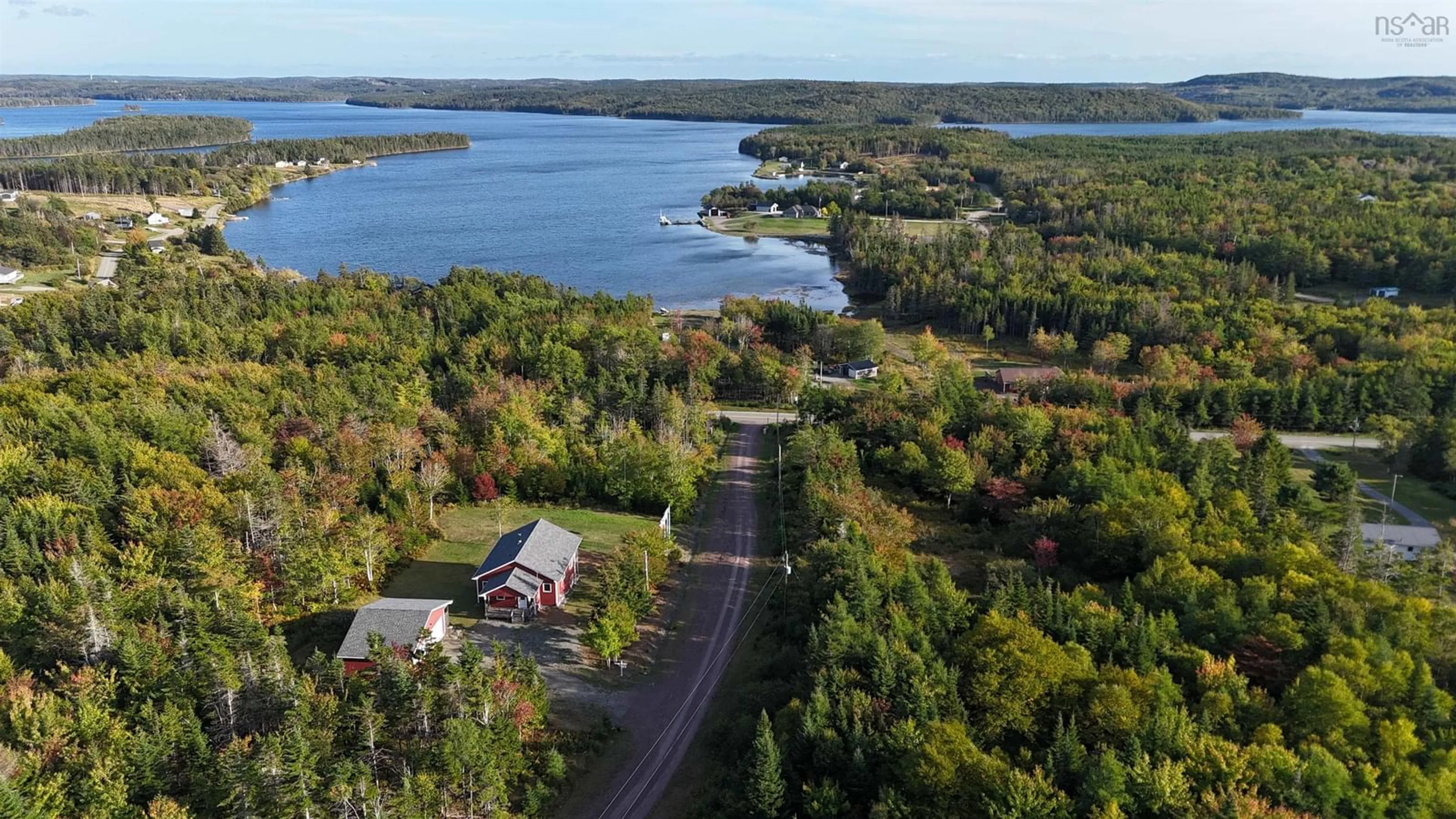 A pic from outside/outdoor area/front of a property/back of a property/a pic from drone, water/lake/river/ocean view for 30 Hill St., French Cove Nova Scotia B0E 3B0