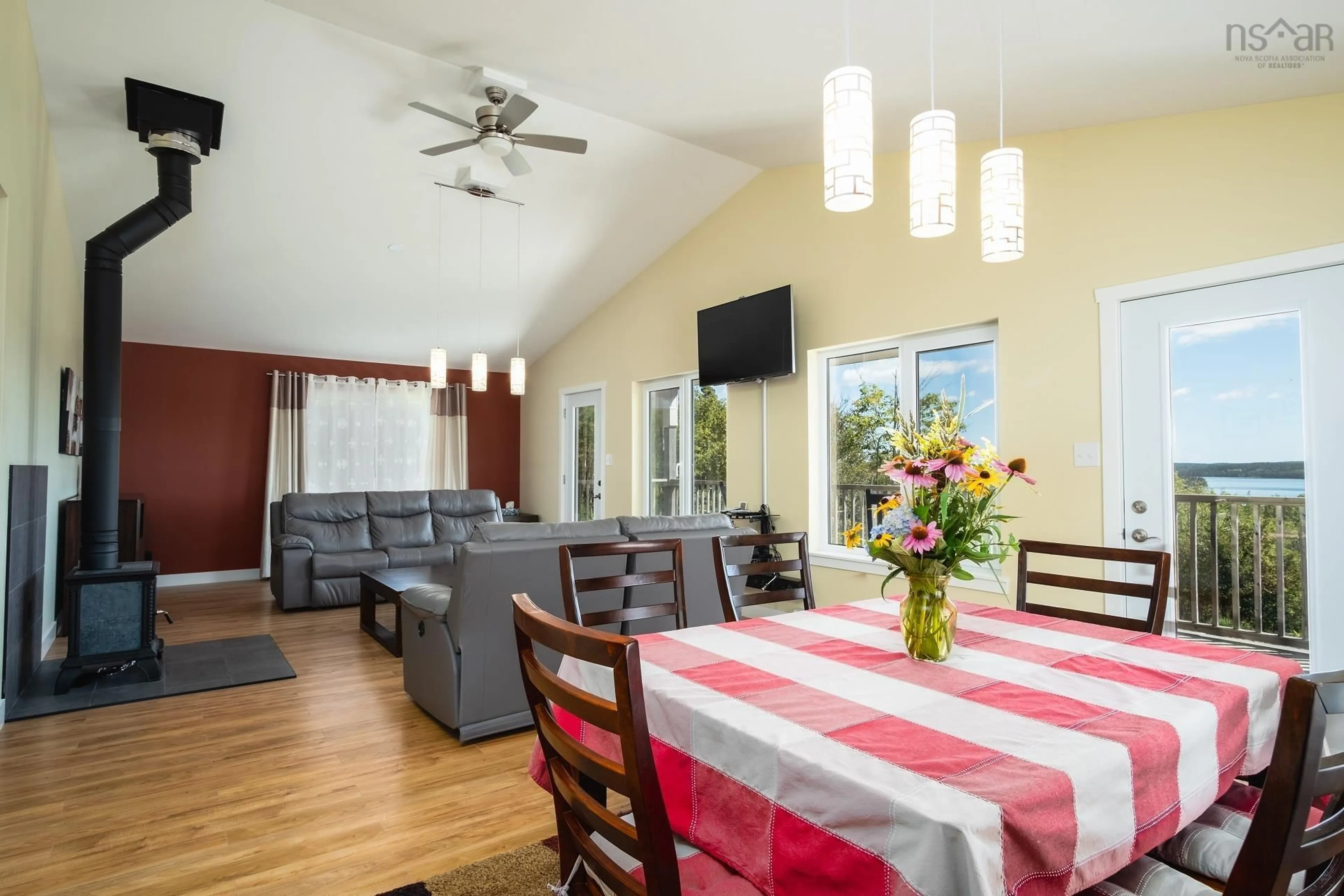 Dining room, wood/laminate floor for 30 Hill St., French Cove Nova Scotia B0E 3B0