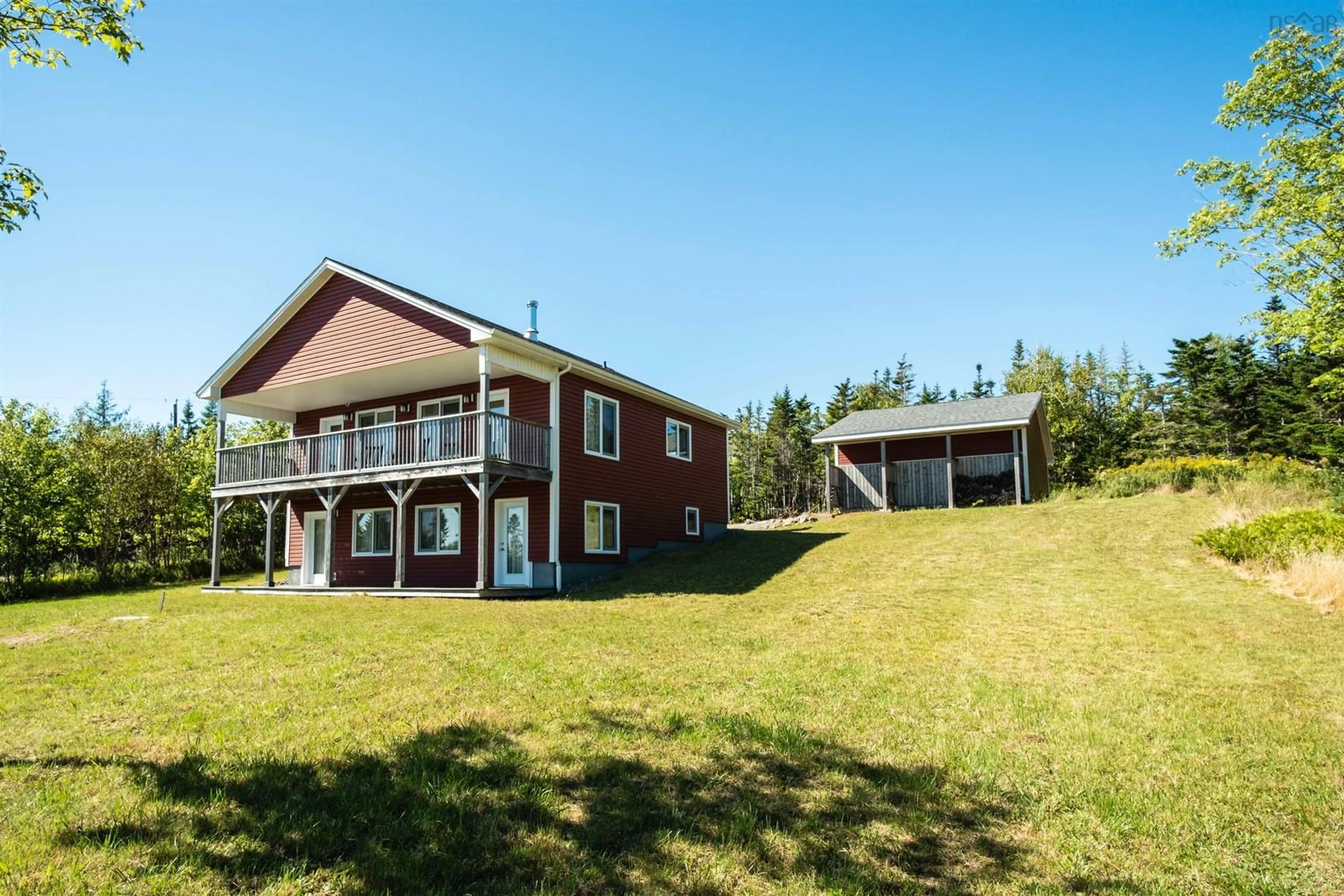 A pic from outside/outdoor area/front of a property/back of a property/a pic from drone, building for 30 Hill St., French Cove Nova Scotia B0E 3B0