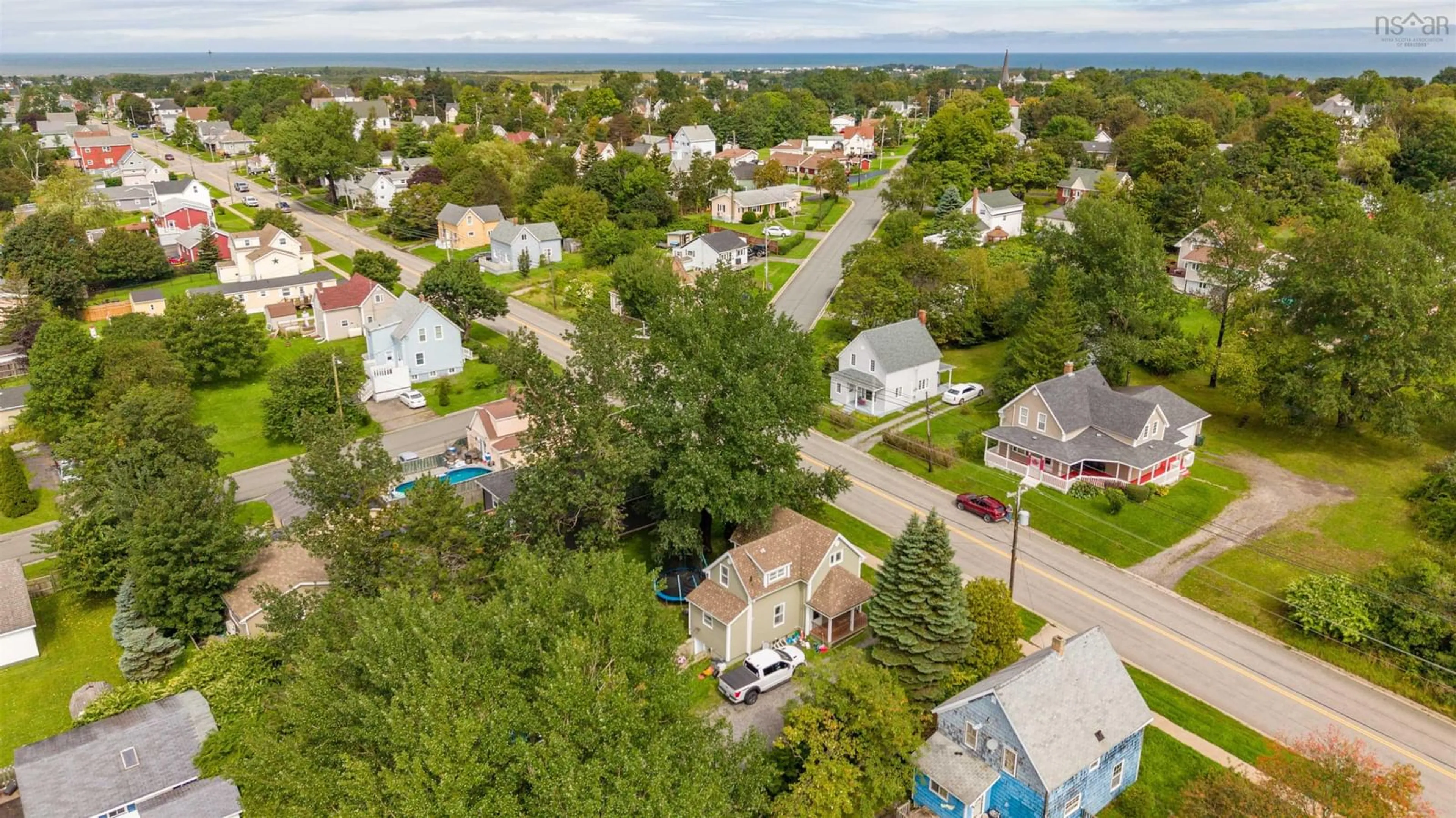 A pic from outside/outdoor area/front of a property/back of a property/a pic from drone, unknown for 78 Fraser Ave, Sydney Mines Nova Scotia B1V 2C5