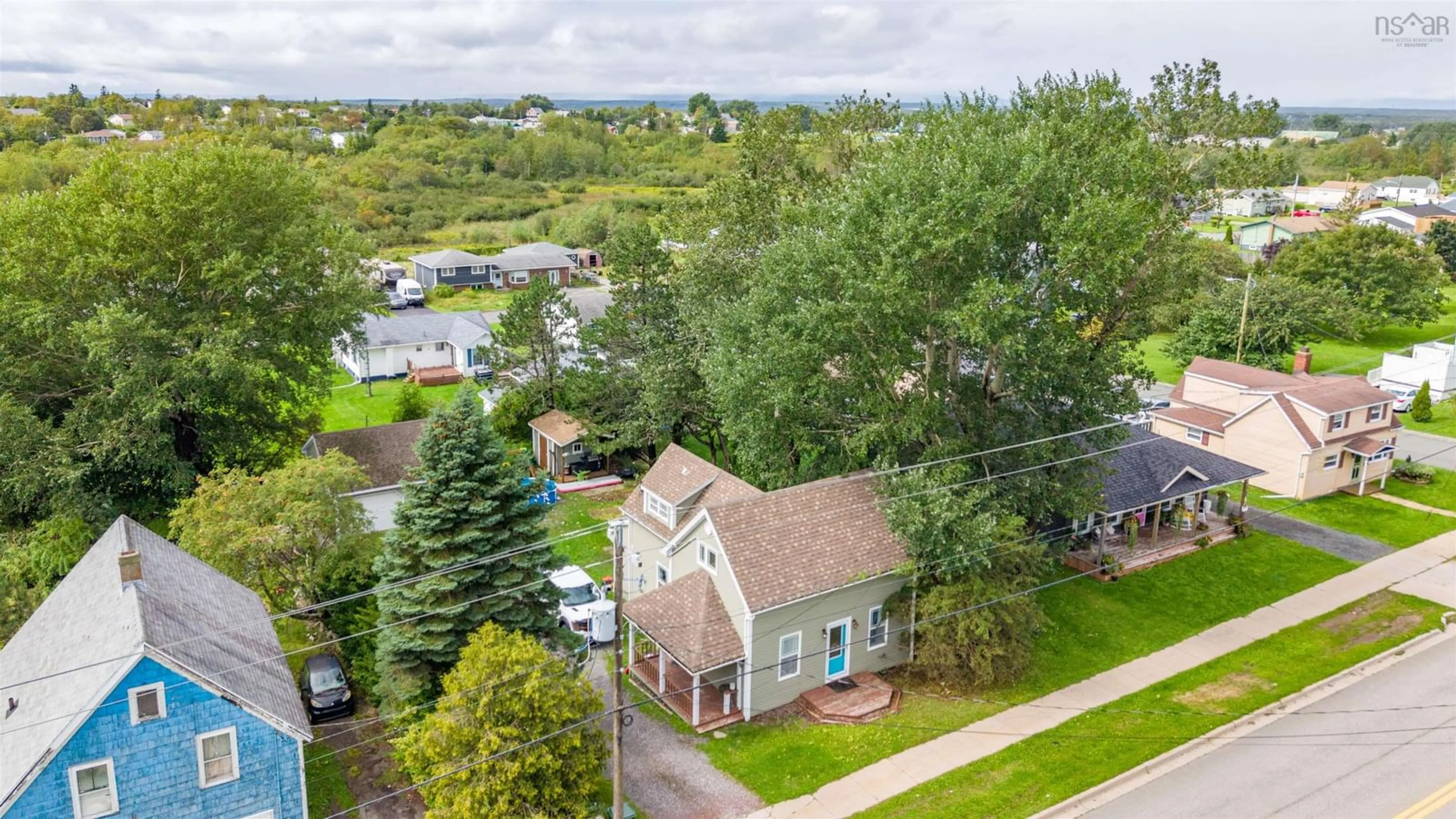 A pic from outside/outdoor area/front of a property/back of a property/a pic from drone, unknown for 78 Fraser Ave, Sydney Mines Nova Scotia B1V 2C5