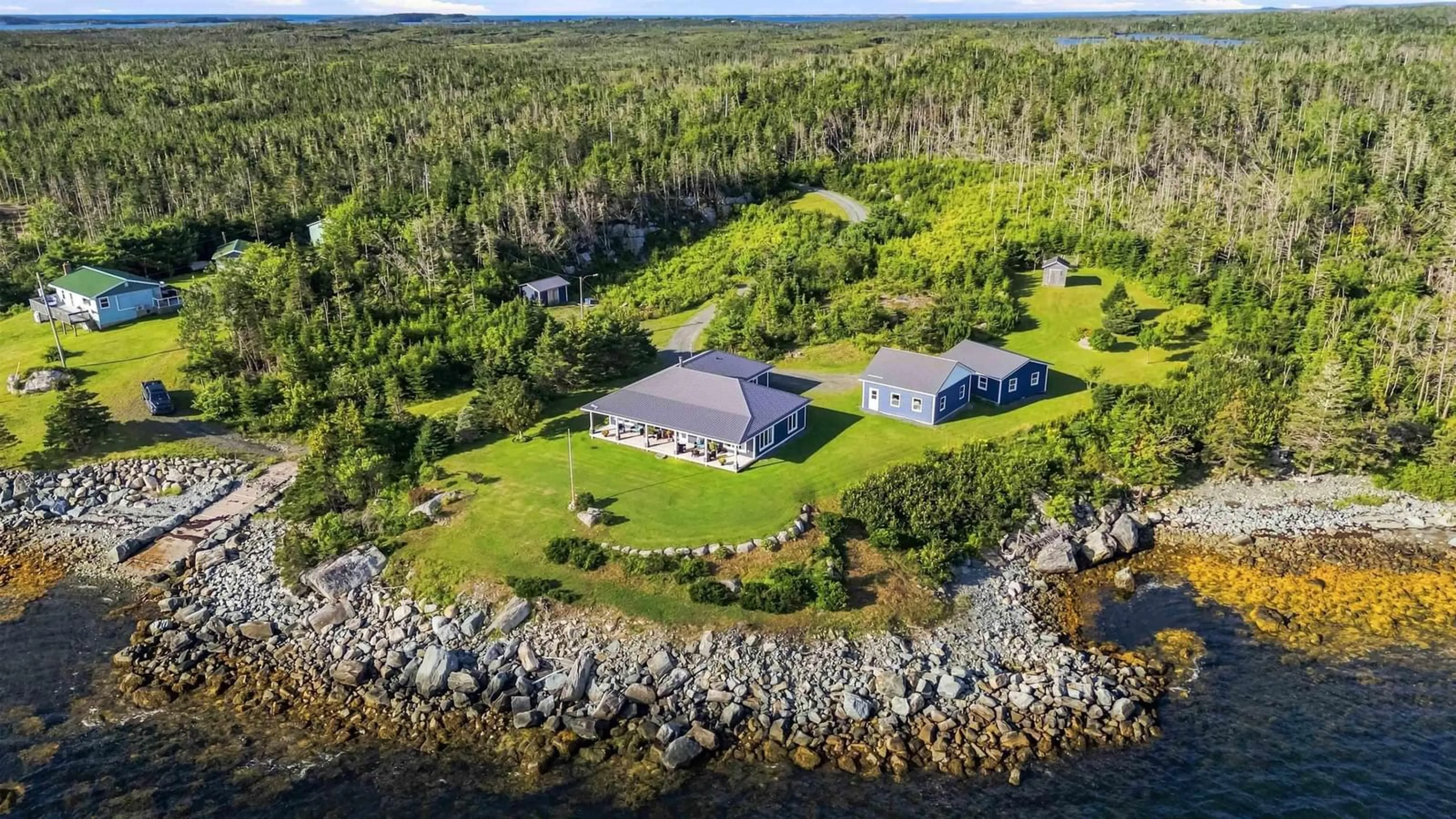A pic from outside/outdoor area/front of a property/back of a property/a pic from drone, water/lake/river/ocean view for 201 Southwest Cove Rd, Southwest Cove Nova Scotia B0J 2L0