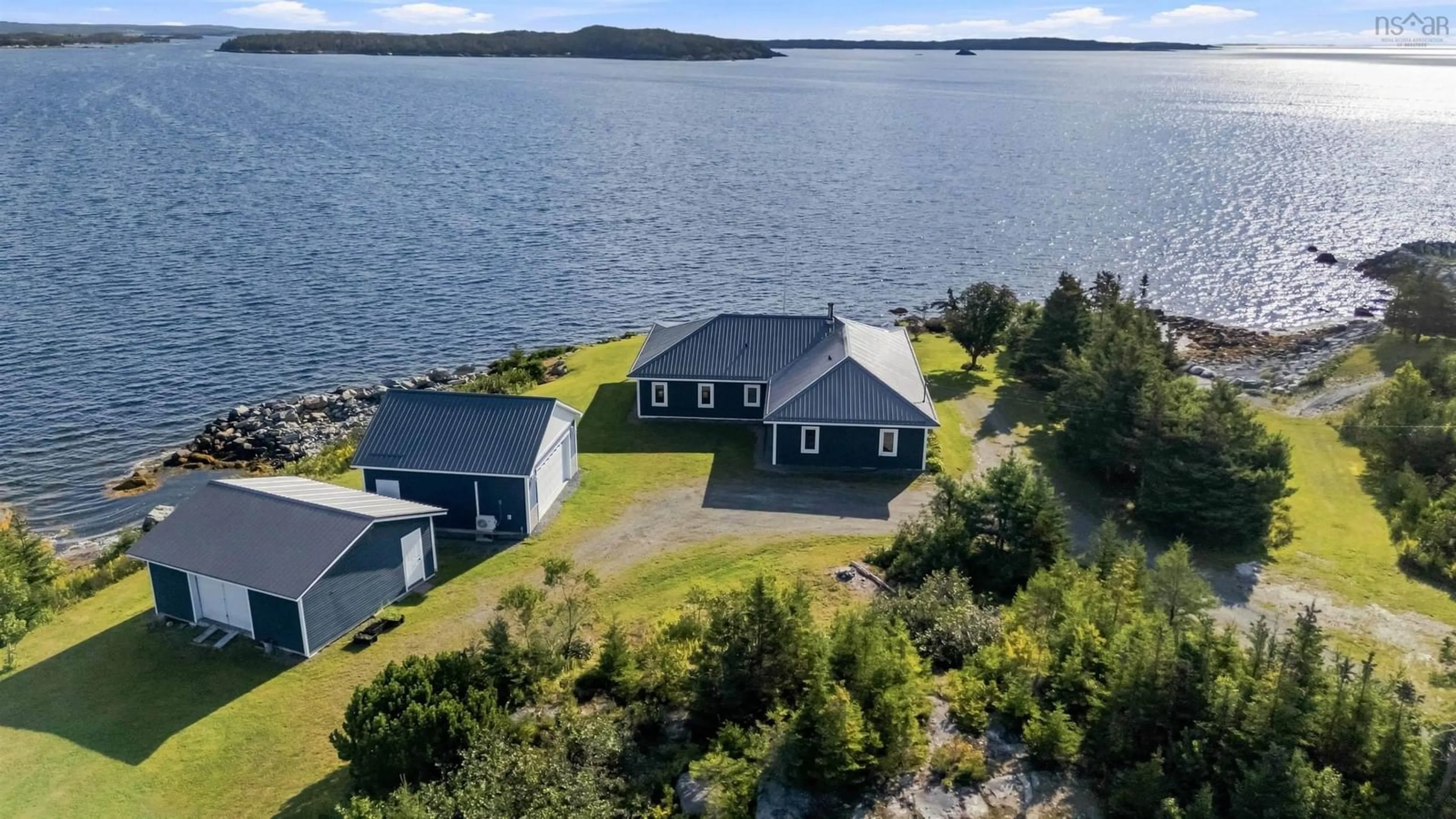 A pic from outside/outdoor area/front of a property/back of a property/a pic from drone, water/lake/river/ocean view for 201 Southwest Cove Rd, Southwest Cove Nova Scotia B0J 2L0