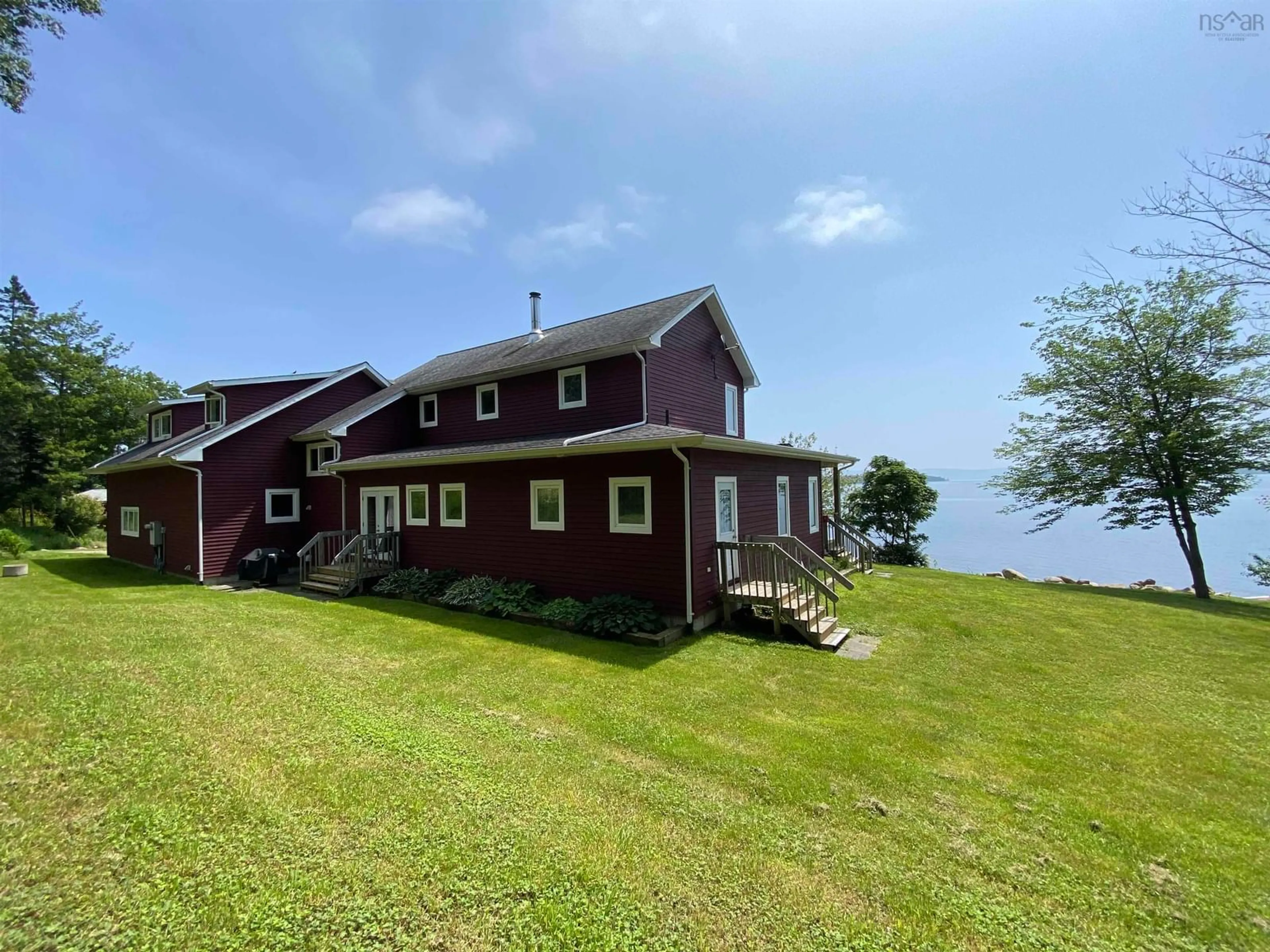A pic from outside/outdoor area/front of a property/back of a property/a pic from drone, water/lake/river/ocean view for 5276 Marble Mountain Rd., Marble Mountain Nova Scotia B0E 3K0