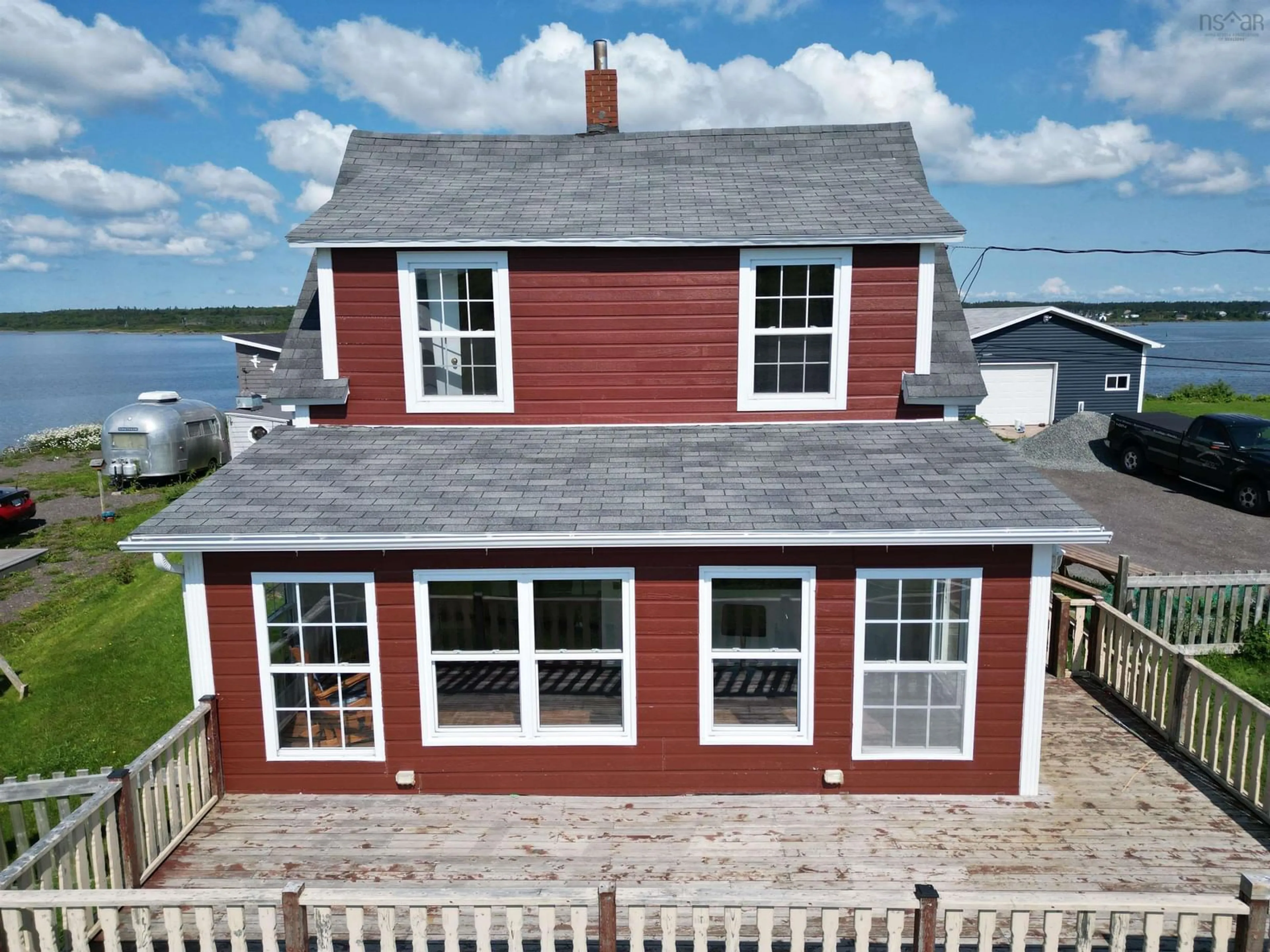 A pic from outside/outdoor area/front of a property/back of a property/a pic from drone, unknown for 276 Southside Petit De Grat Rd., Alderney Point Nova Scotia B0E 2L0