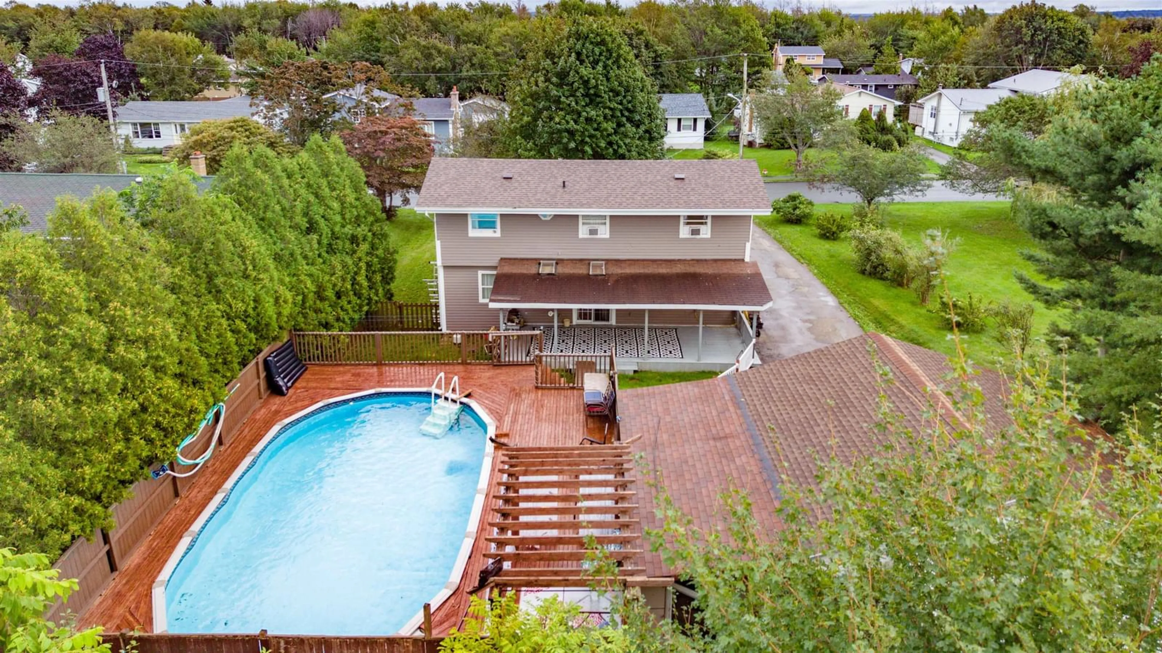 A pic from outside/outdoor area/front of a property/back of a property/a pic from drone, water/lake/river/ocean view for 56 Holic Ave, North Sydney Nova Scotia B2A 3R8