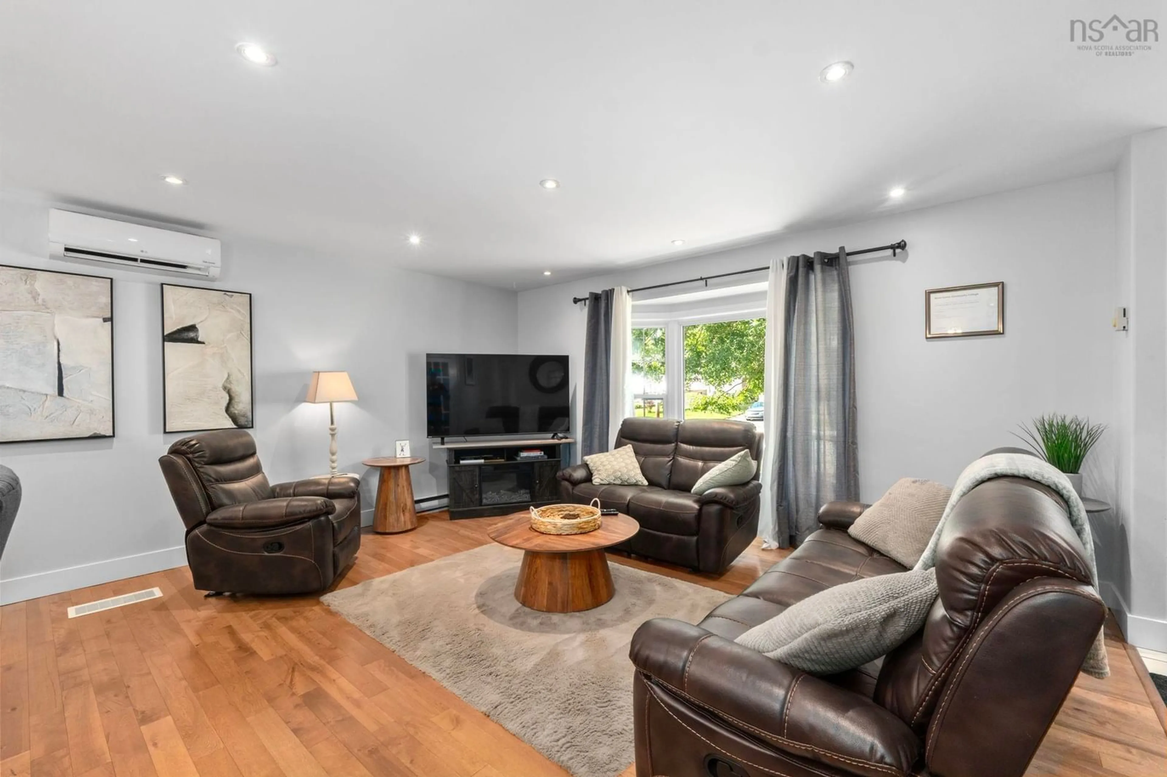 Living room with furniture, wood/laminate floor for 30 Forestglen Dr, Timberlea Nova Scotia B3T 1J4