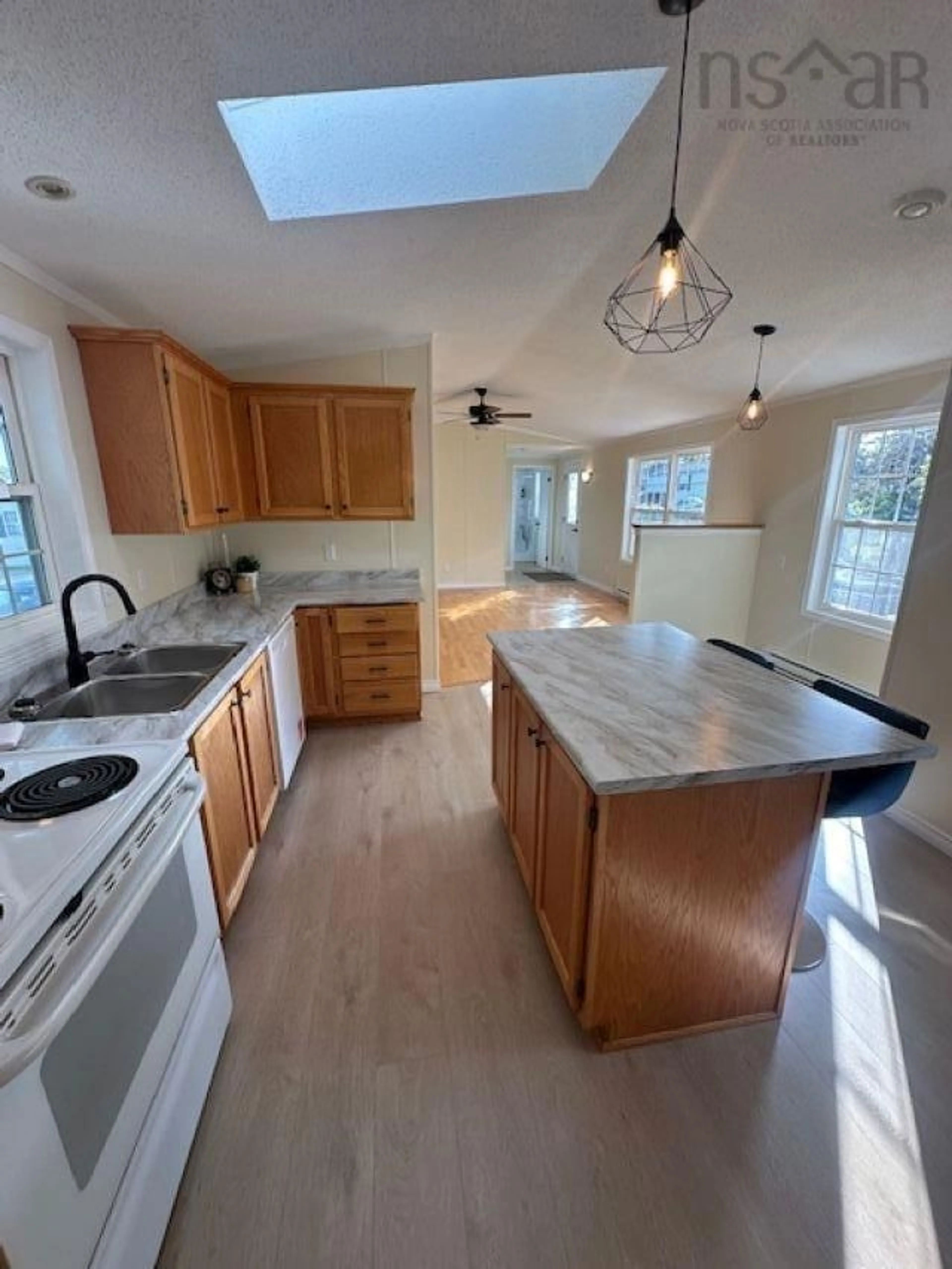 Open concept kitchen, ceramic/tile floor for 8 Tenth St, Lucasville Nova Scotia B4B 1R6