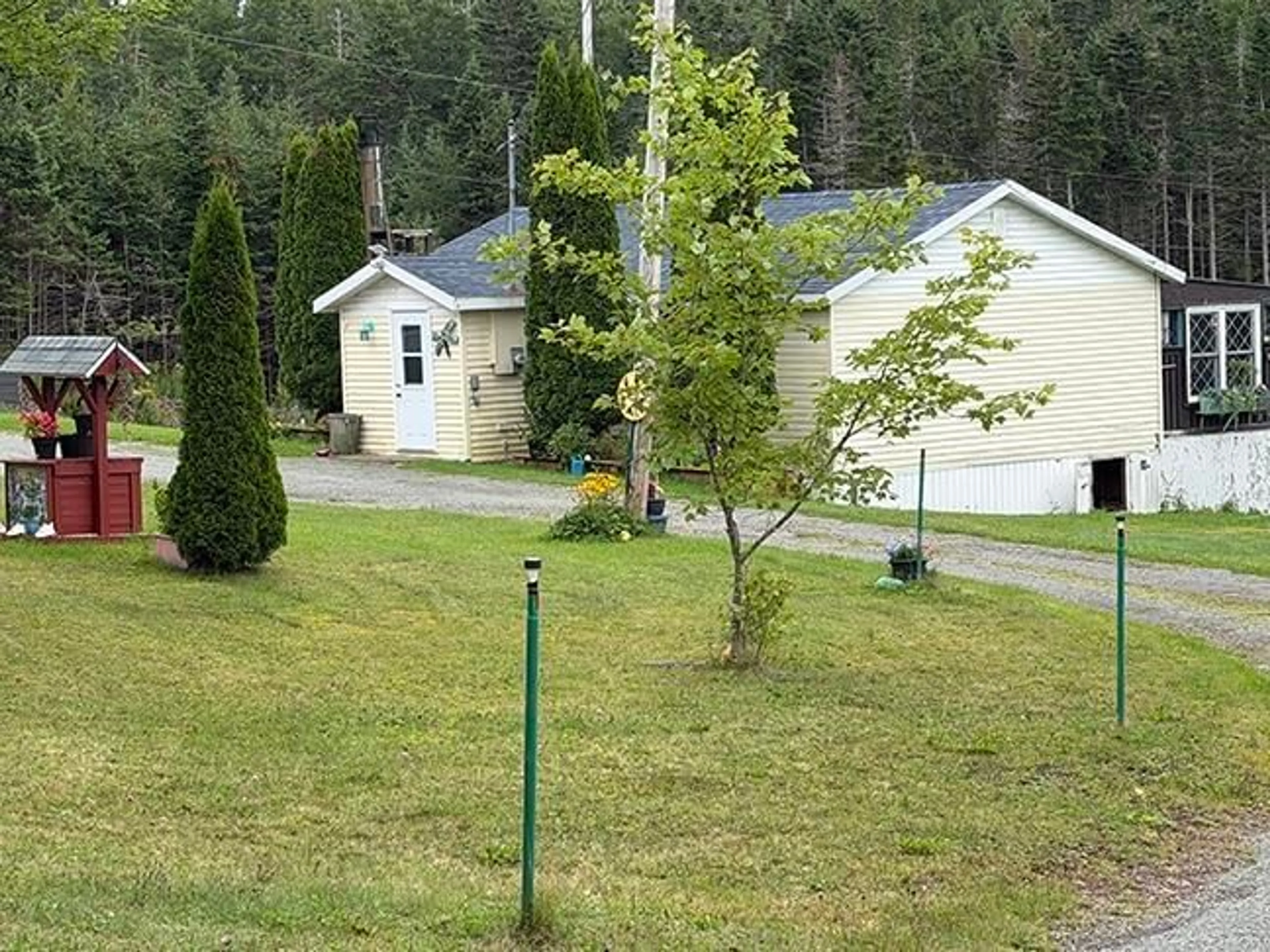 A pic from outside/outdoor area/front of a property/back of a property/a pic from drone, unknown for 66 Richards Pond Rd, River Bourgeois Nova Scotia B0E 2X0