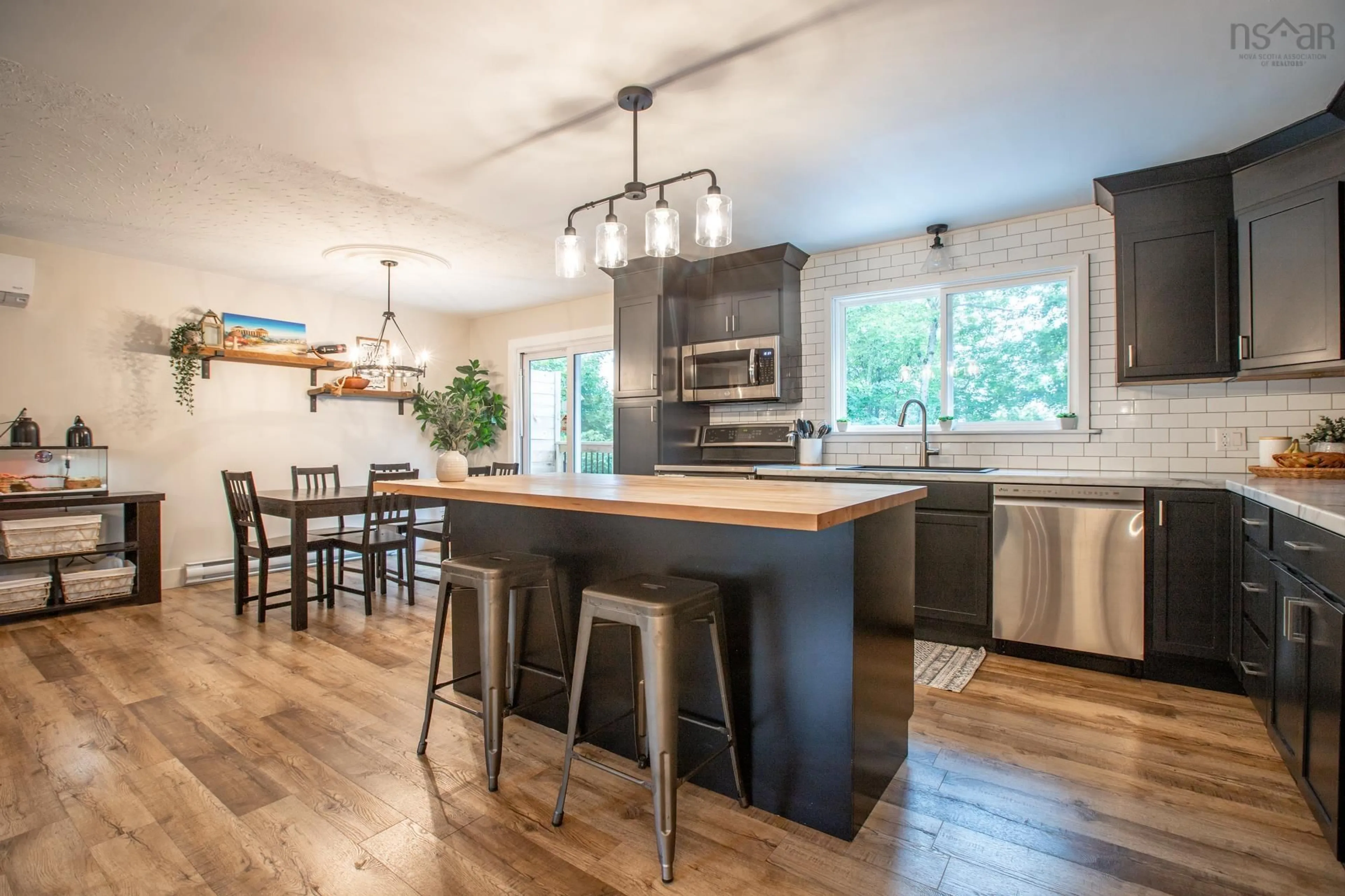 Open concept kitchen, wood/laminate floor for 21 Franklyn Drive, Beaver Bank Nova Scotia B4G 1A5