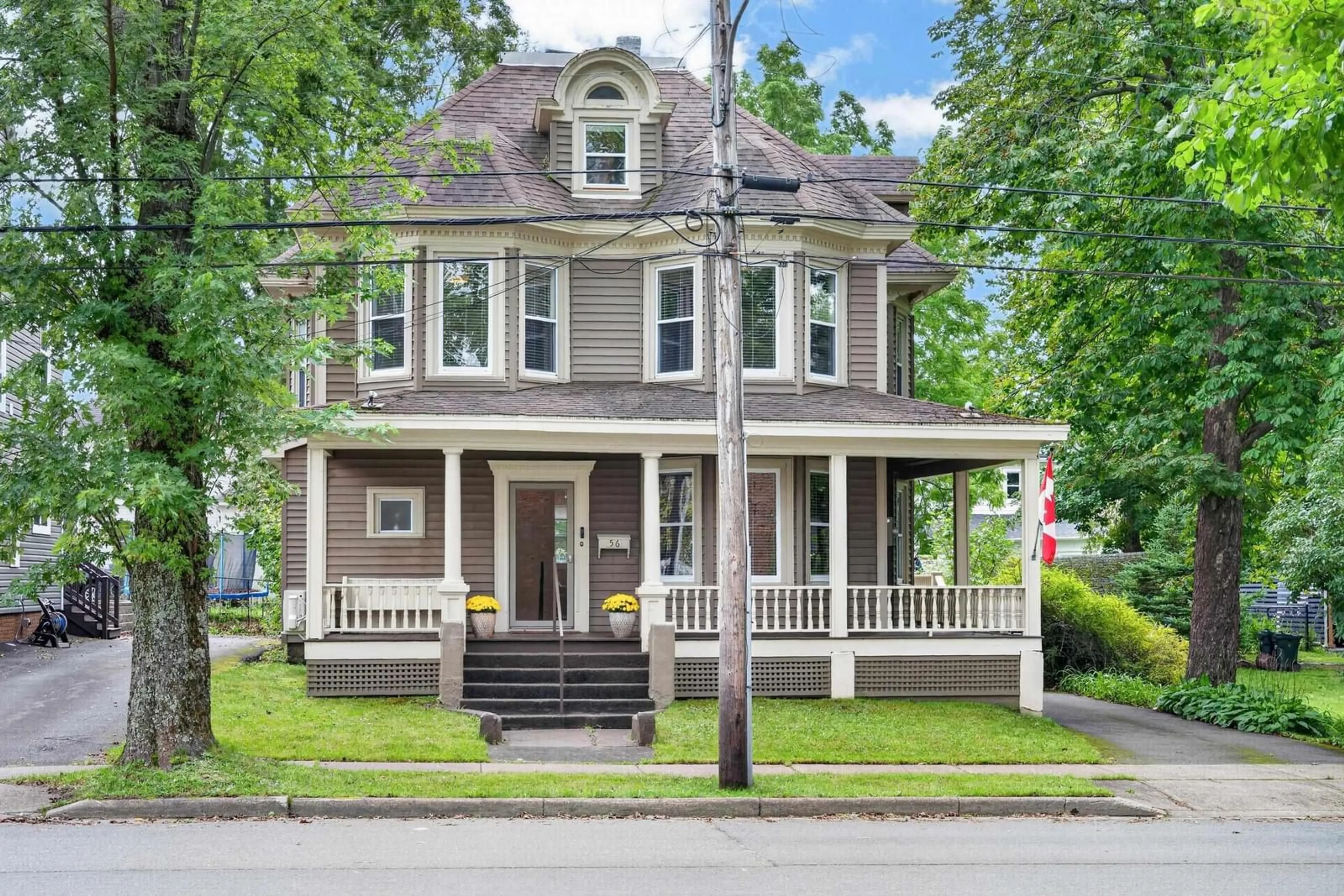 Home with vinyl exterior material, street for 56 Whitney Ave, Sydney Nova Scotia B1P 4Z7