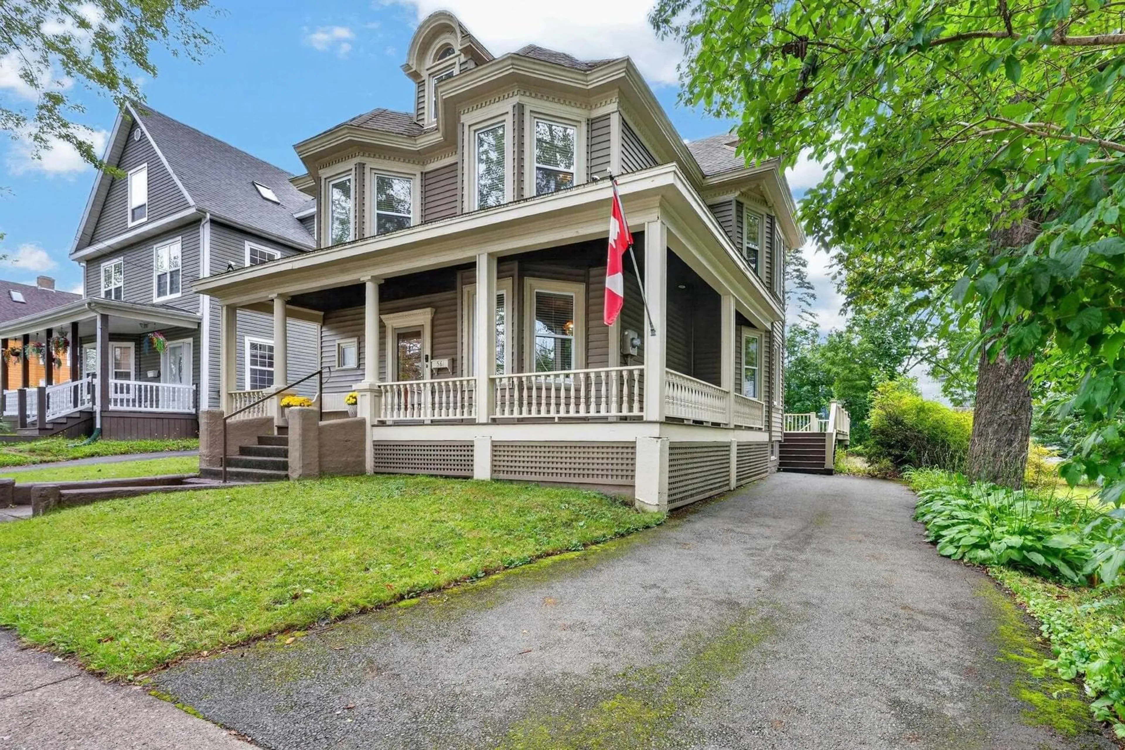 Home with vinyl exterior material, street for 56 Whitney Ave, Sydney Nova Scotia B1P 4Z7