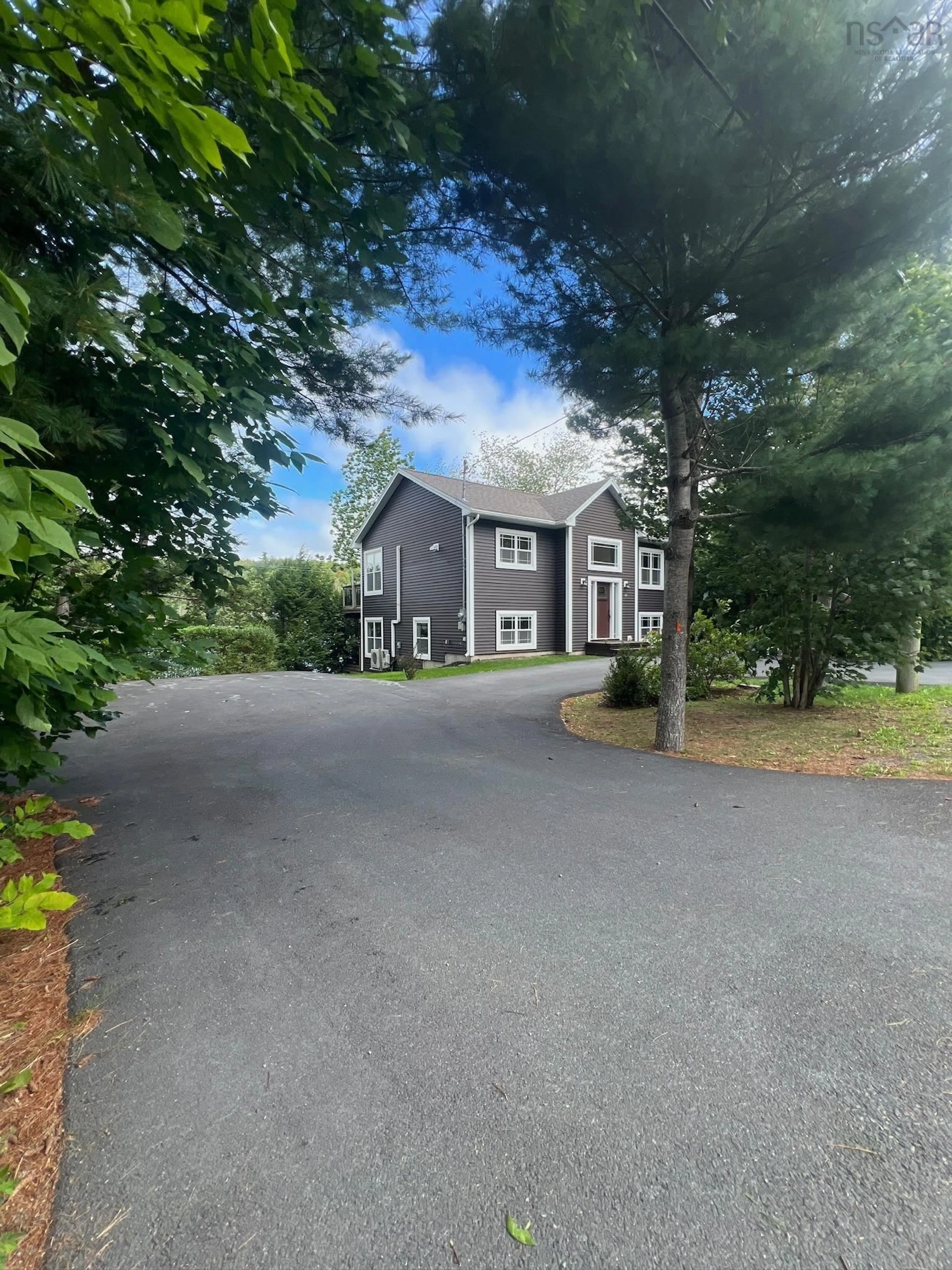 A pic from outside/outdoor area/front of a property/back of a property/a pic from drone, street for 40 Tucker Lake Rd, Beaver Bank Nova Scotia B4G 1C3