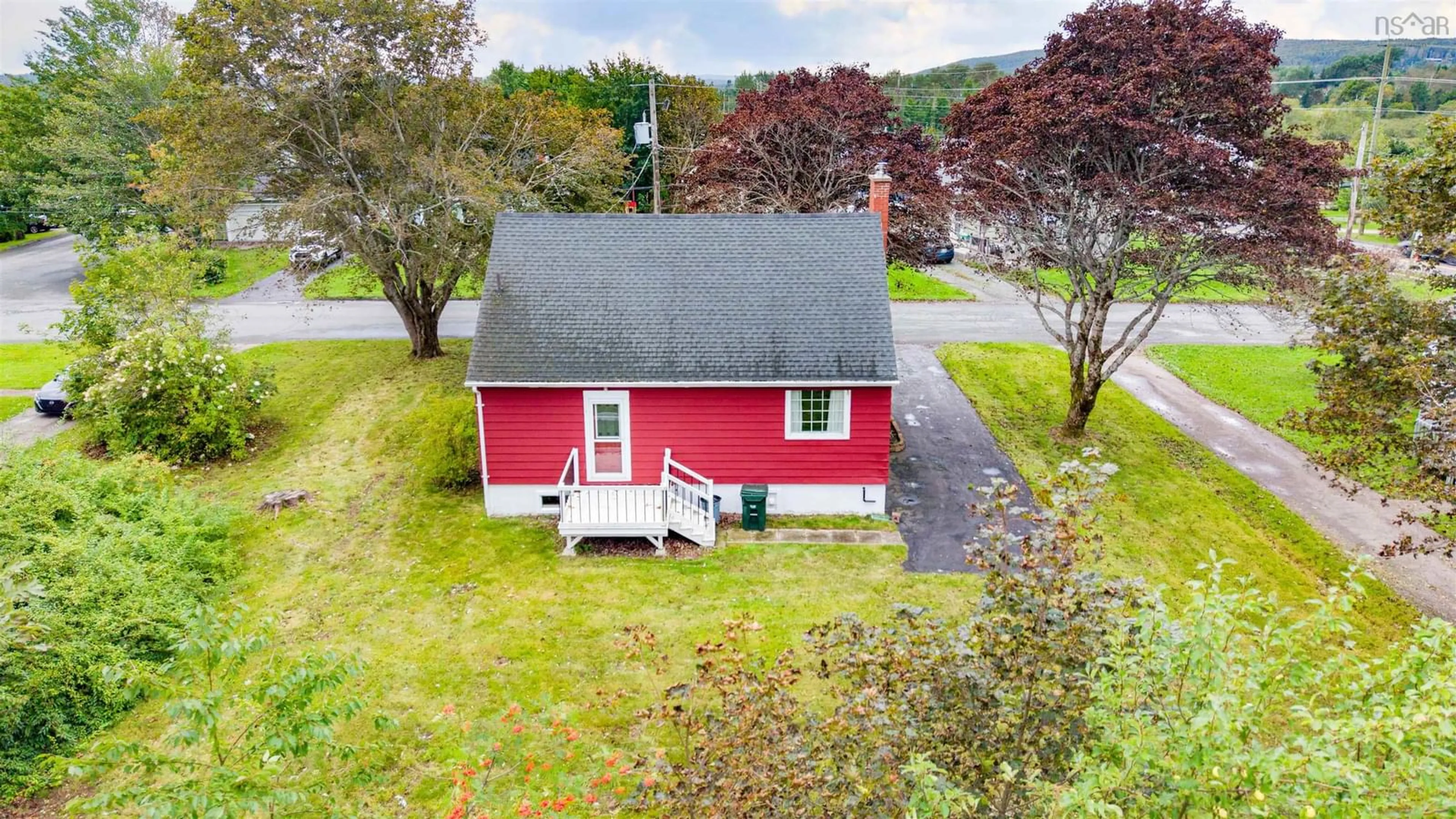 A pic from outside/outdoor area/front of a property/back of a property/a pic from drone, street for 11 Leeside Dr, Coxheath Nova Scotia B1R 1S5
