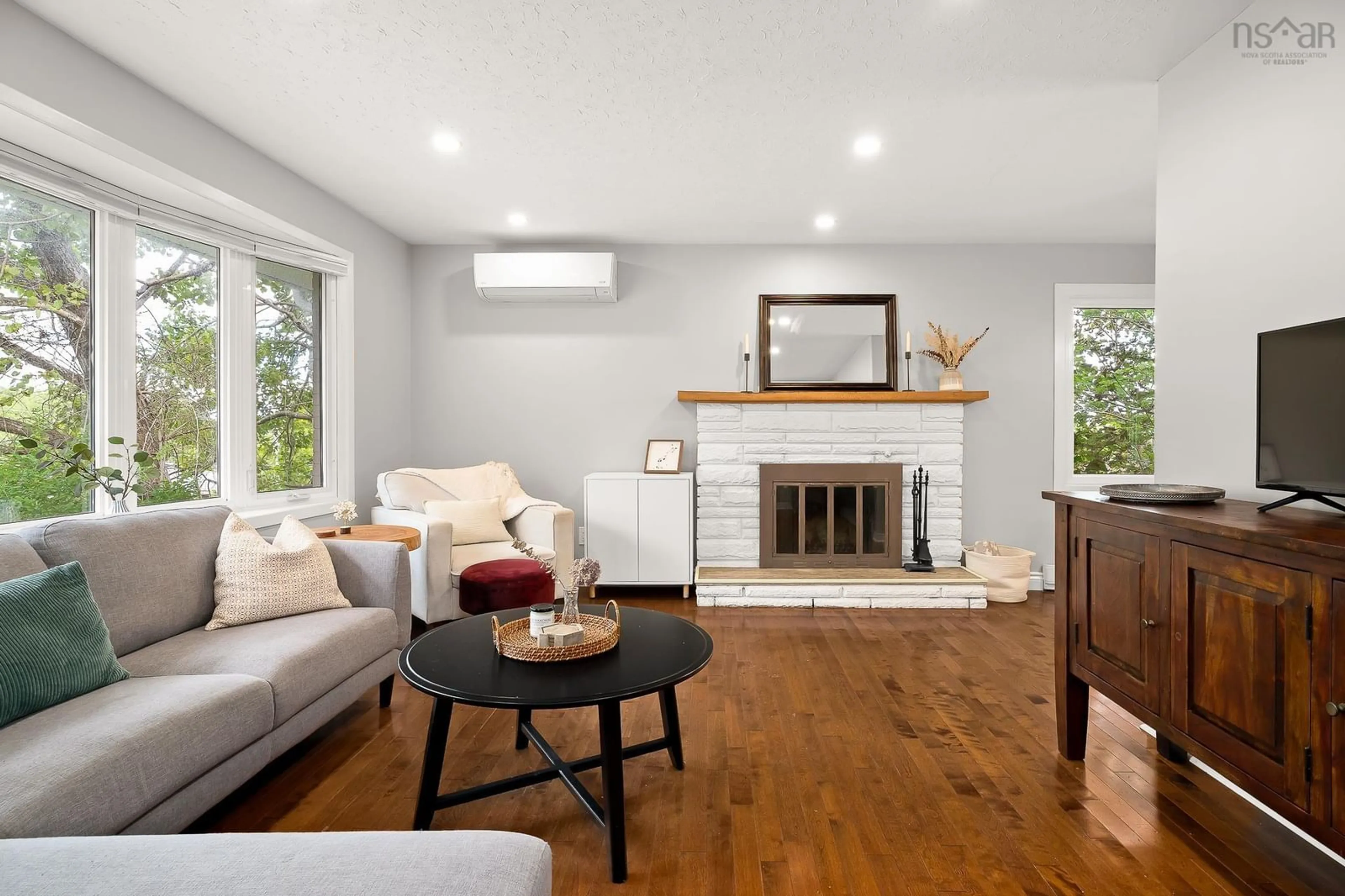 Living room with furniture, wood/laminate floor for 17 Glenora Ave, Halifax Nova Scotia B4B 0M3