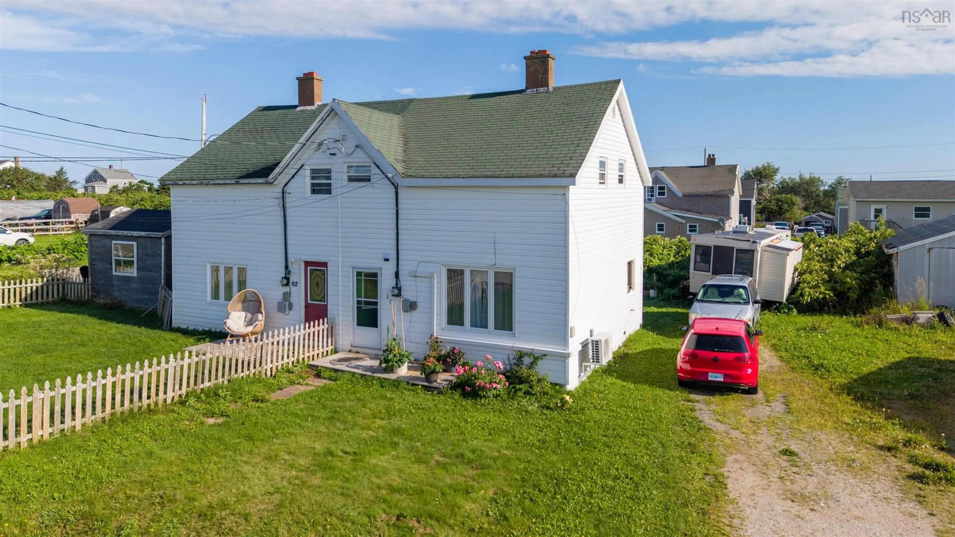 A pic from outside/outdoor area/front of a property/back of a property/a pic from drone, street for Centre Ave #60, Donkin Nova Scotia B1A 6N3